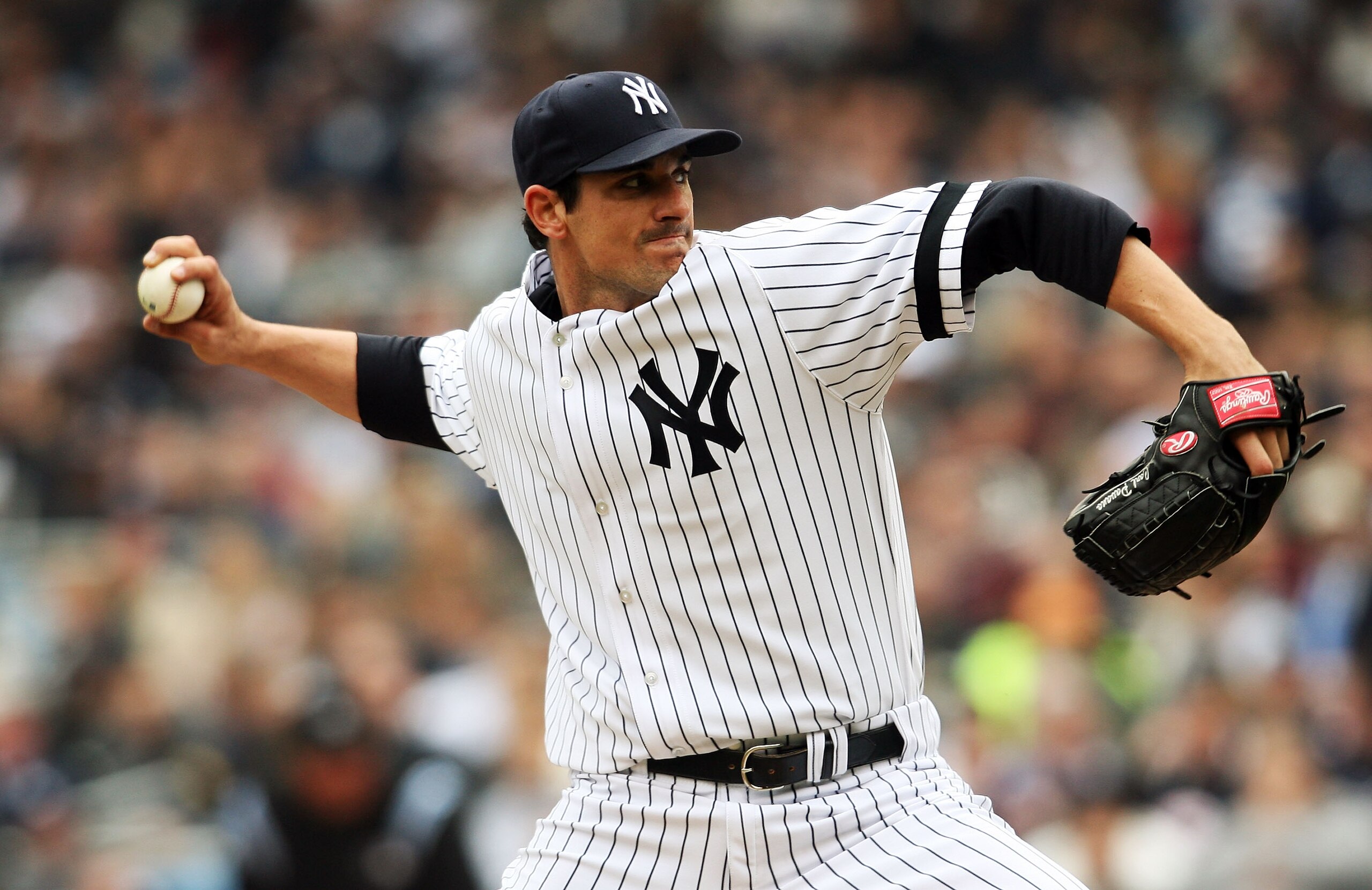 NEW YORK - APRIL 02:  Carl Pavano #45 of the New York Yankees pitches against the Tampa Bay Devil Rays during their Opening Day game at Yankee Stadium April 2, 2007 in the Bronx borough of New York City.  (Photo by Nick Laham/Getty Images)