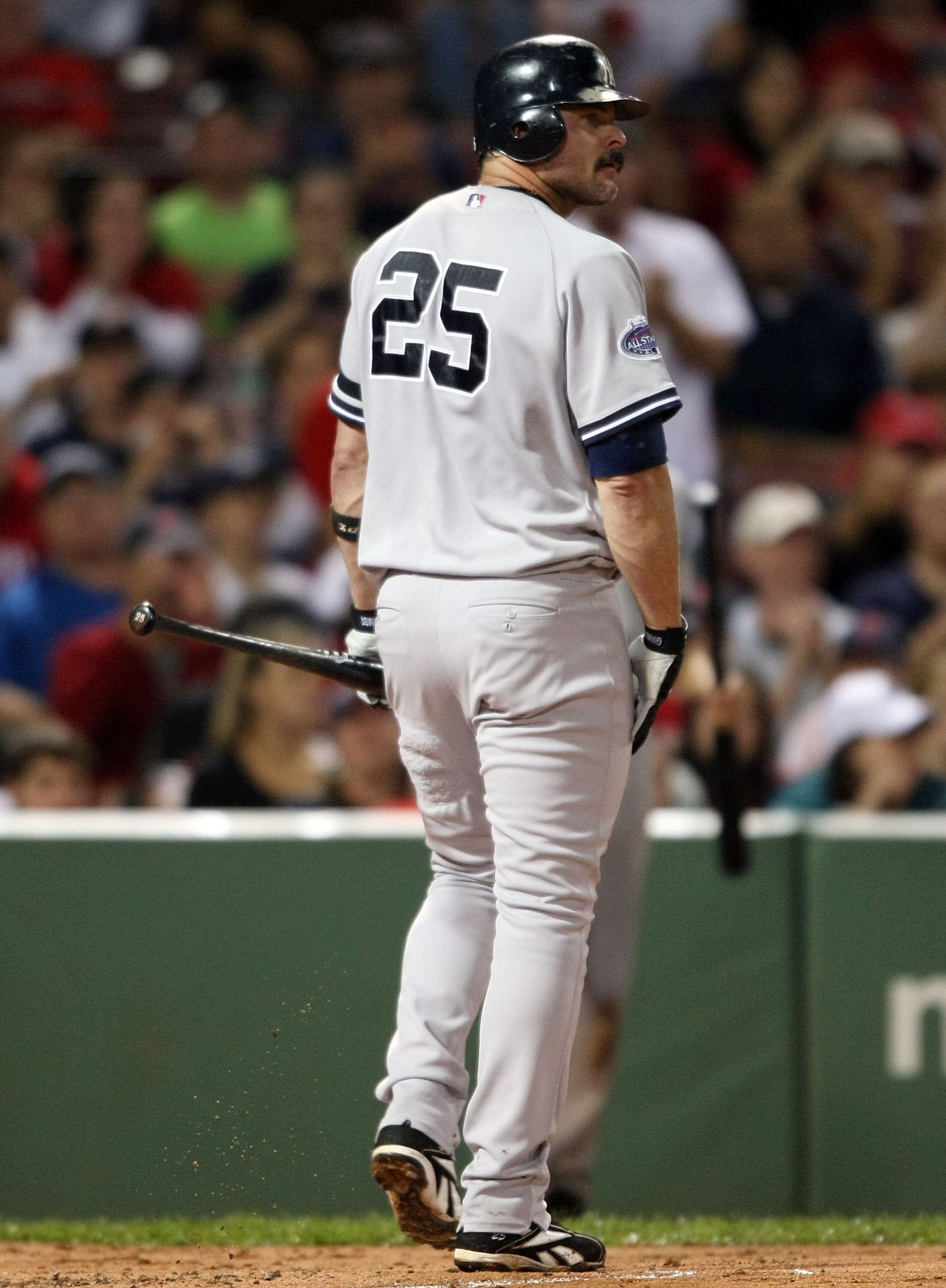 BOSTON - SEPTEMBER 28:  Jason Giambi #25 of the New York Yankees walks back to the dugout after he struck out against the Boston Red Sox on September 28, 2008 during game two of the double header at Fenway Park in Boston, Massachusetts.  (Photo by Elsa/Ge