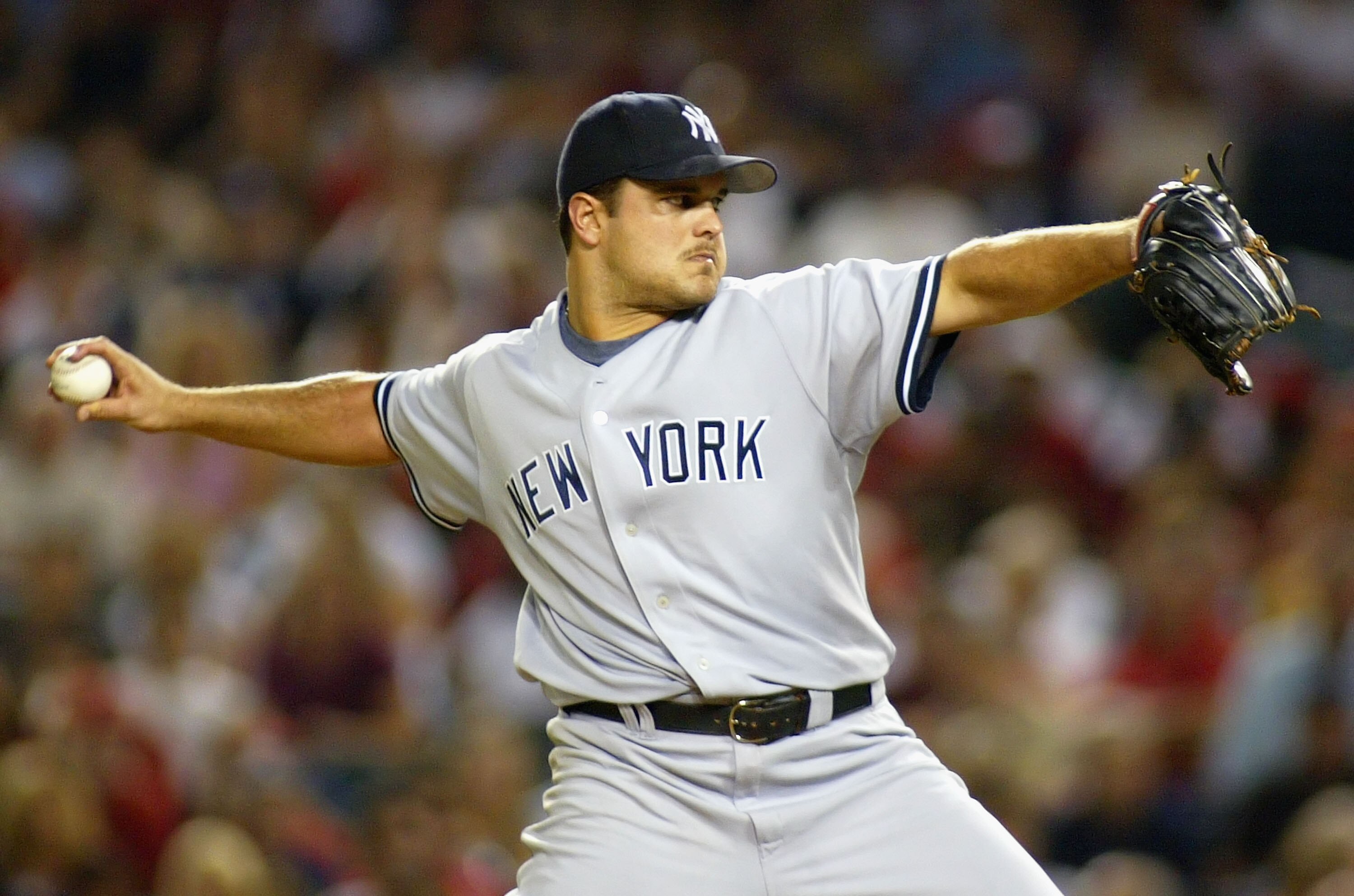 ANAHEIM, CA - AUGUST 25:  Pitcher Jaret Wright #34 of the New York Yankees pitches against the Los Angeles Angels of Anaheim during the MLB game held on August 25, 2006 at Angel Stadium in Anaheim, California.   (Photo by Christian Petersen/Getty Images)