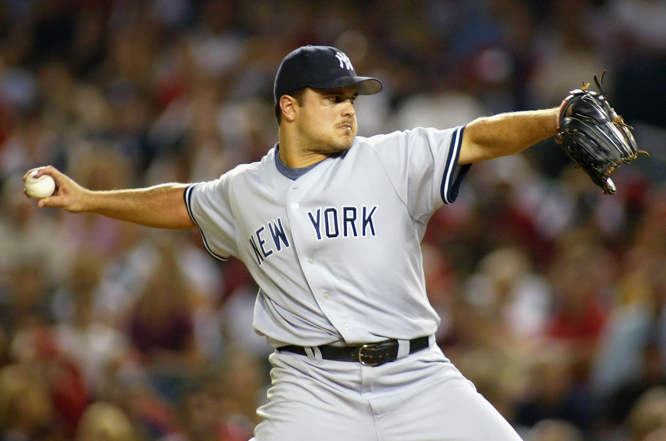 ANAHEIM, CA - AUGUST 25:  Pitcher Jaret Wright #34 of the New York Yankees pitches against the Los Angeles Angels of Anaheim during the MLB game held on August 25, 2006 at Angel Stadium in Anaheim, California.   (Photo by Christian Petersen/Getty Images)