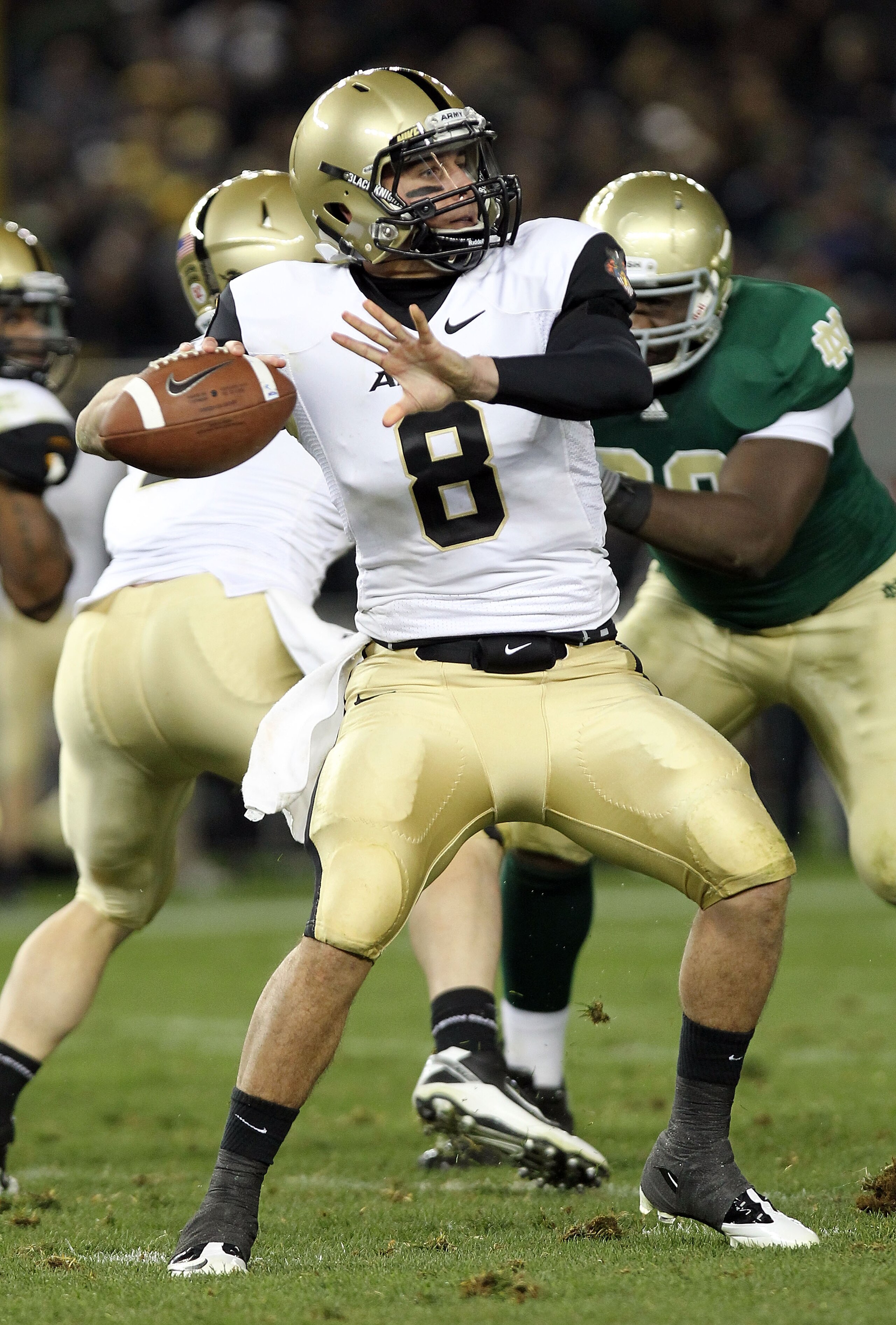 NEW YORK - NOVEMBER 20:  Trent Steelman #8 of the Army Black Knights passes against the Notre Dame Fighting Irish at Yankee Stadium on November 20, 2010 in the Bronx borough of New York City.  (Photo by Nick Laham/Getty Images)