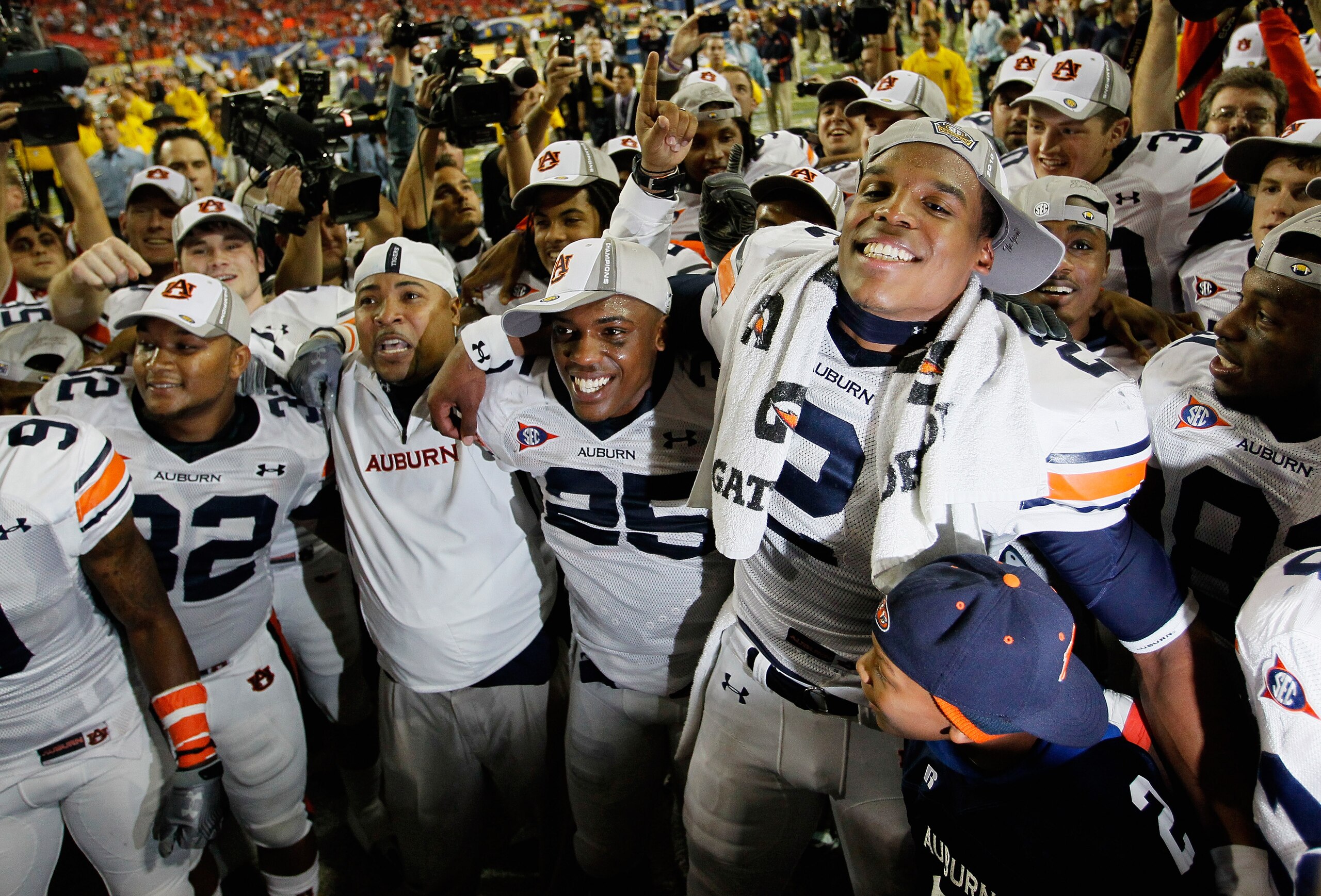 ATLANTA, GA - DECEMBER 04: Quarterback Cam Newton #2 of the Auburn Tigers celebrates after their 56-17 win over the South Carolina Gamecocks during the 2010 SEC Championship at Georgia Dome on December 4, 2010 in Atlanta, Georgia. (Photo by Kevin C. Cox ATLANTA, GA - DECEMBER 04: Quarterback Cam Newton #2 of the Auburn Tigers celebrates after their 56-17 win over the South Carolina Gamecocks during the 2010 SEC Championship at Georgia Dome on December 4, 2010 in Atlanta, Georgia. (Photo by Kevin C. Cox