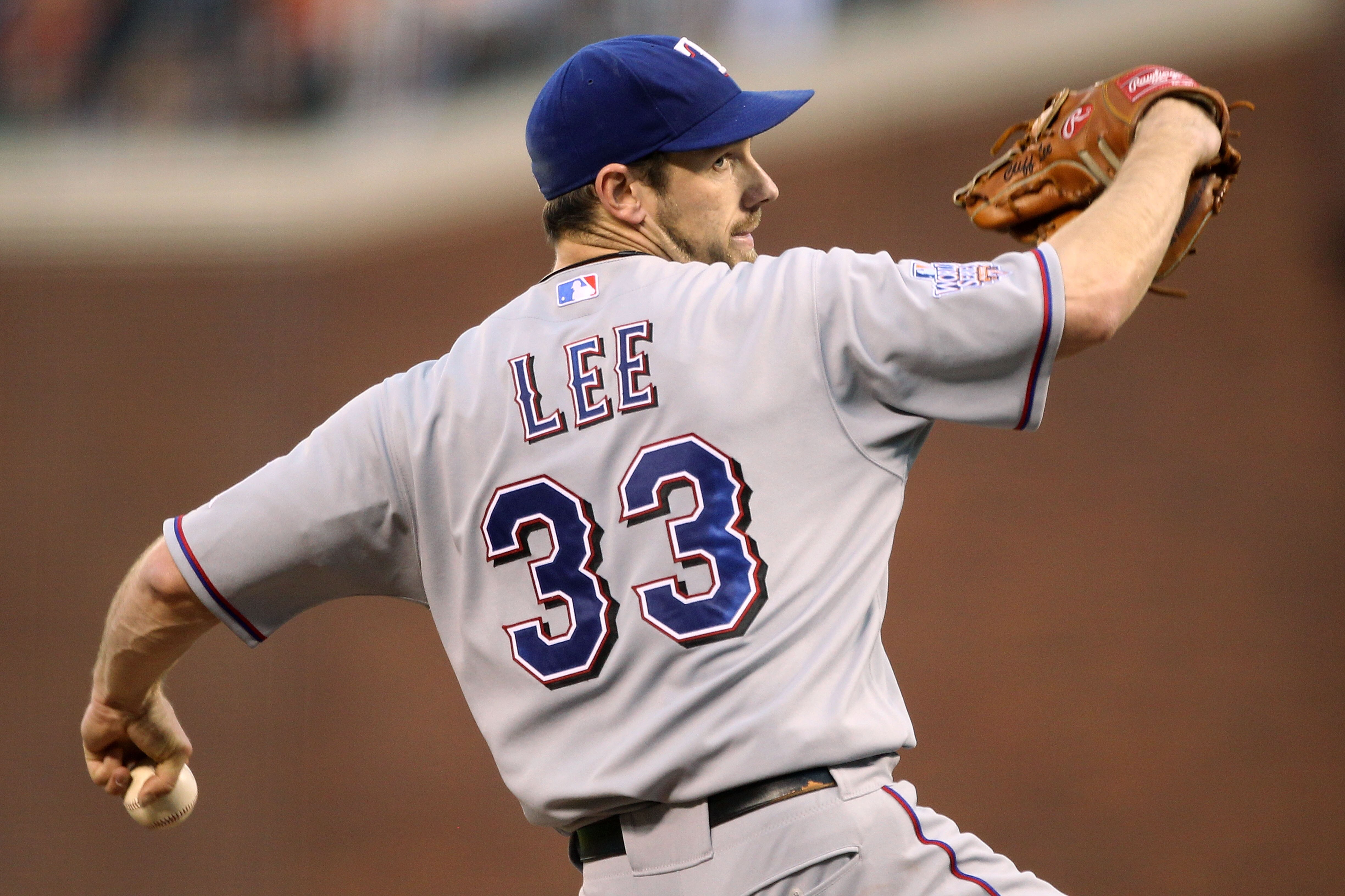 SAN FRANCISCO - OCTOBER 27:  Cliff Lee #33 of the Texas Rangers pitches against the San Francisco Giants in Game One of the 2010 MLB World Series at AT&T Park on October 27, 2010 in San Francisco, California.  (Photo by Ezra Shaw/Getty Images)
