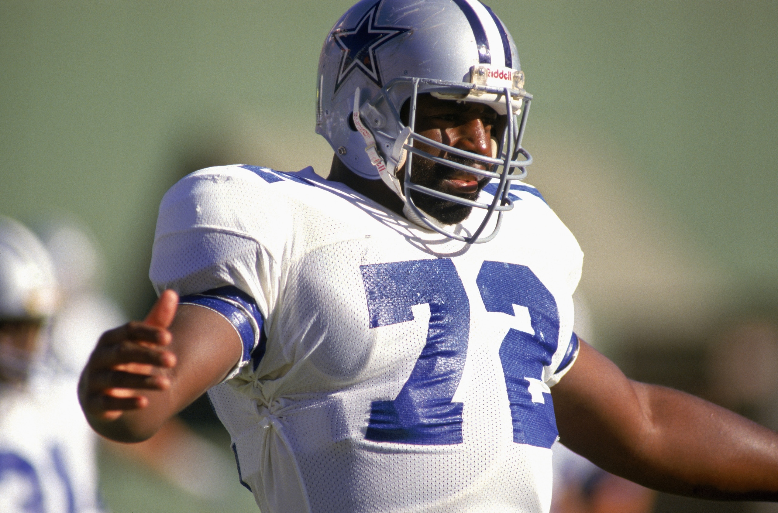 ANAHEIM, CA - 1985:  Defensive lineman Ed 'Too Tall' Jones #72 of the Dallas Cowboys celebrates a play during a 1985 NFL game against the Los Angeles Rams at Anaheim Stadium in Anaheim, California.  (Photo by Stephen Dunn/Getty Images)