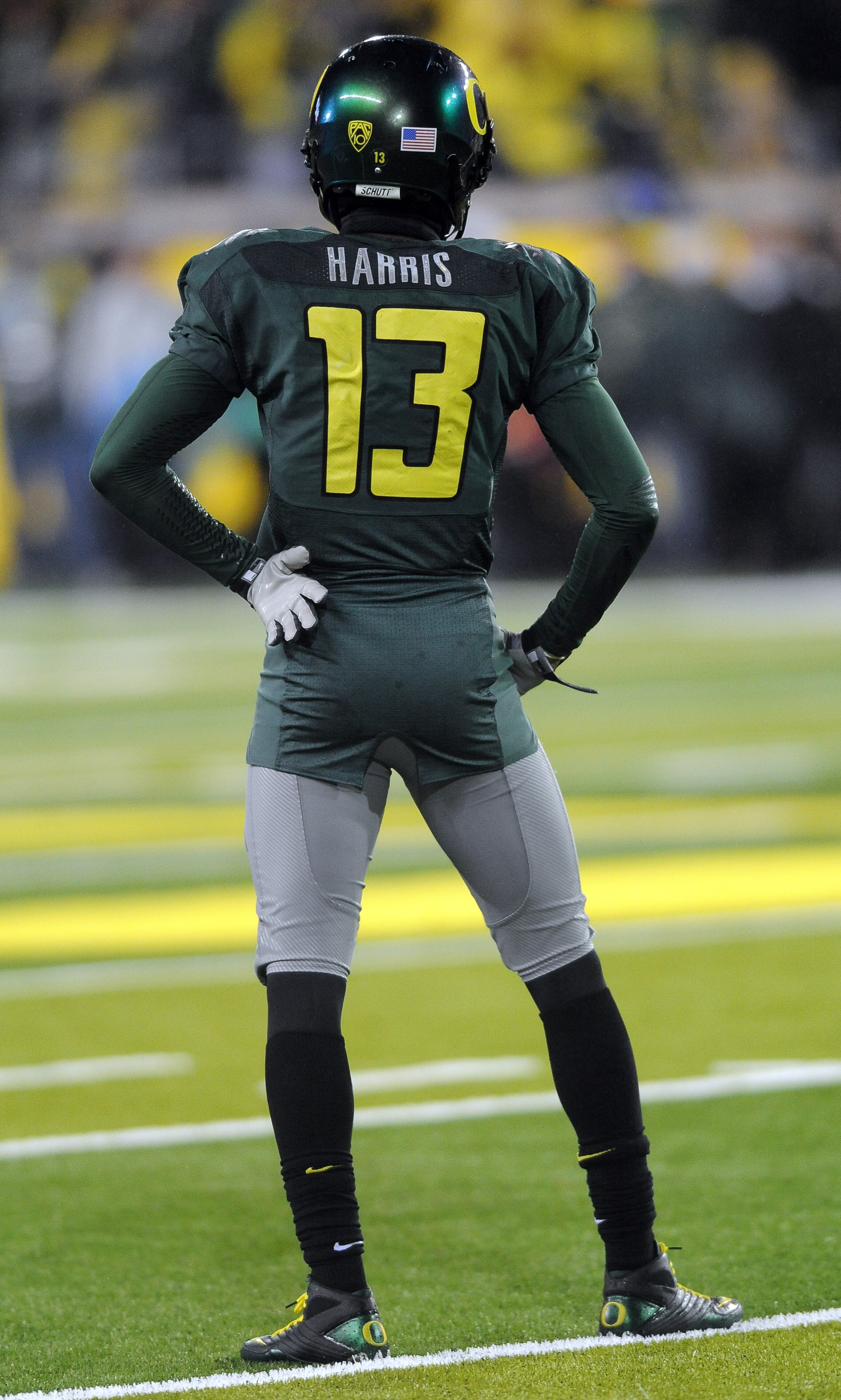 EUGENE, OR - NOVEMBER 26: Cornerback Cliff Harris #13 of the Oregon Ducks waits at the line of scrimmage in the fourth quarter of the game against the Arizona Wildcats at Autzen Stadium on November 26, 2010 in Eugene, Oregon. (Photo by Steve Dykes/Getty I
