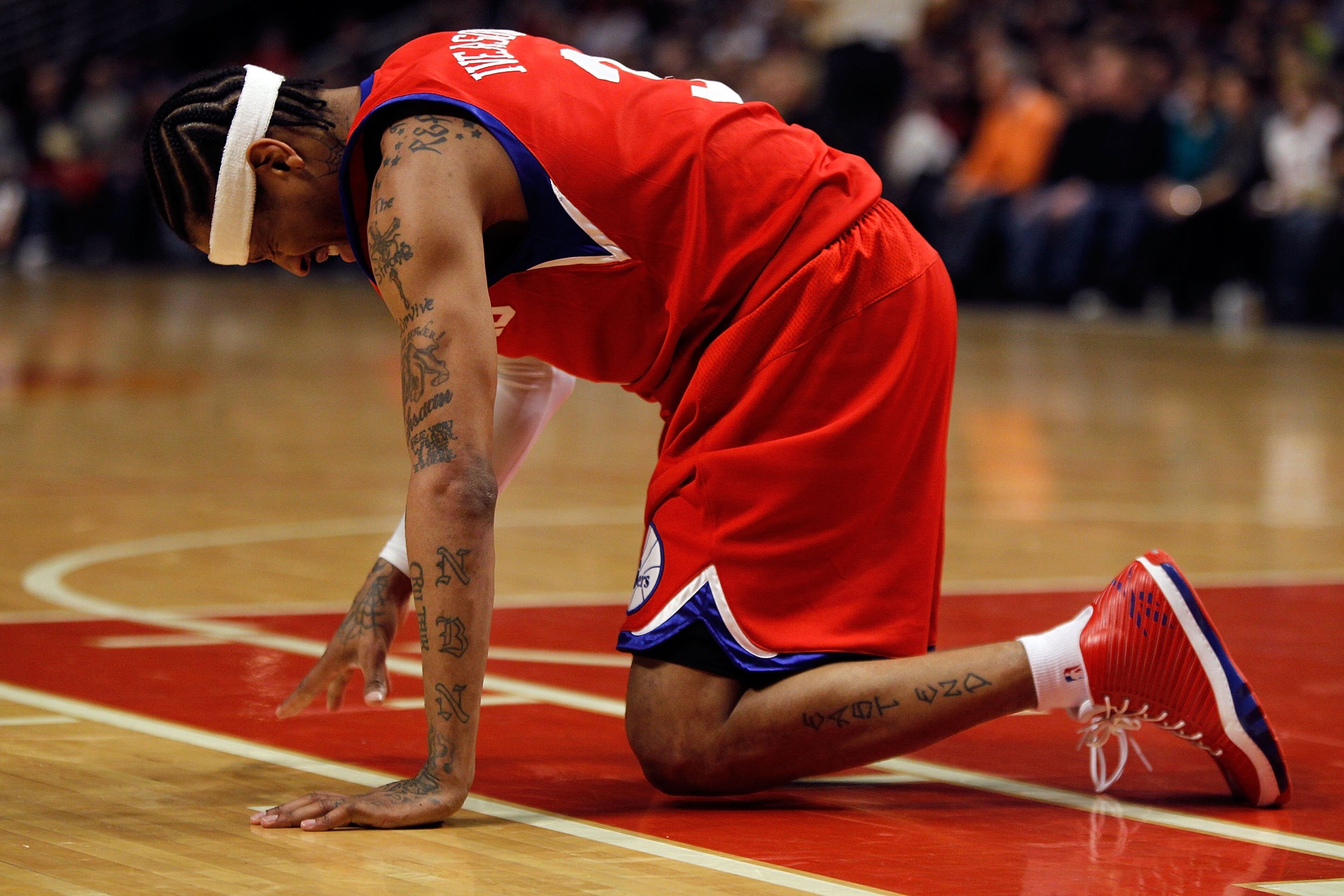 CHICAGO - FEBRUARY 20: Allen Iverson #3 of the Philadelphia 76ers is slow to get up after being hit in the face during a game against the Chicago Bulls at the United Center on February 20, 2010 in Chicago, Illinois. The Bulls defeated the 76ers 122-90. NO CHICAGO - FEBRUARY 20: Allen Iverson #3 of the Philadelphia 76ers is slow to get up after being hit in the face during a game against the Chicago Bulls at the United Center on February 20, 2010 in Chicago, Illinois. The Bulls defeated the 76ers 122-90. NO