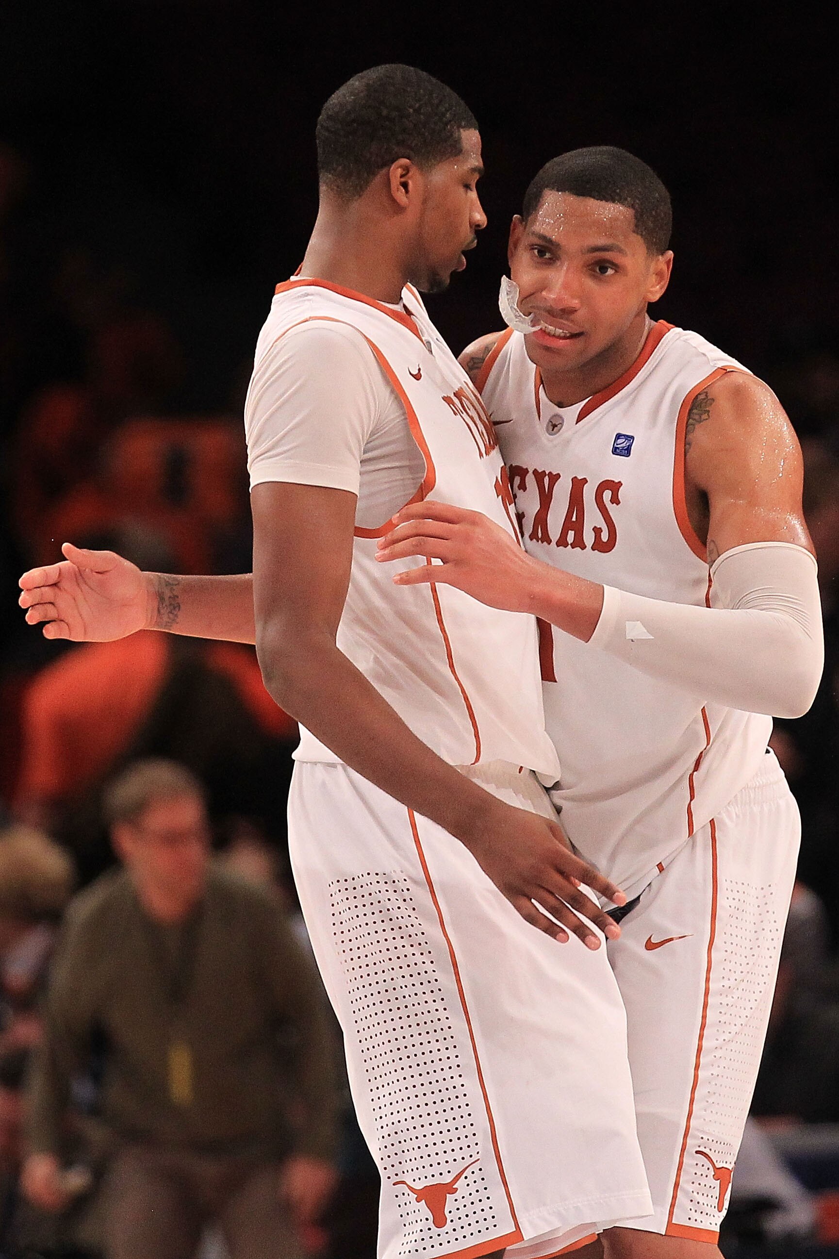 NEW YORK - NOVEMBER 18: Tristan Thompson #13 of the Texas Longhorns celebrates victory with team mate Gary Johnson against the Illinois Fighting Illini during the 2k Sports Classic at Madison Square Garden on November 18, 2010 in New York, New York.  (Pho