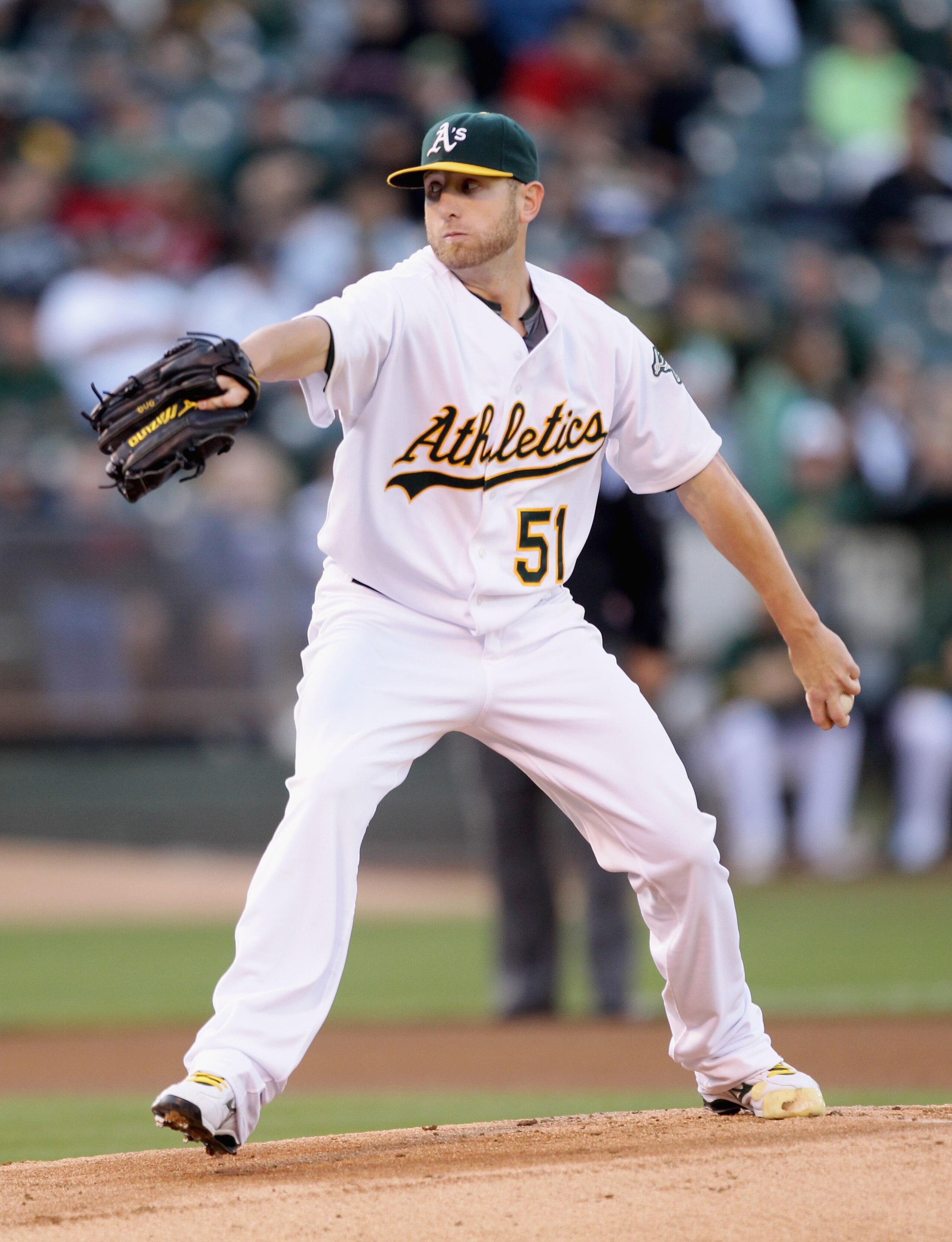 OAKLAND, CA - AUGUST 06:  Dallas Braden #51 of the Oakland Athletics pitches against the Texas Rangers at the Oakland-Alameda County Coliseum on August 6, 2010 in Oakland, California.  (Photo by Ezra Shaw/Getty Images)