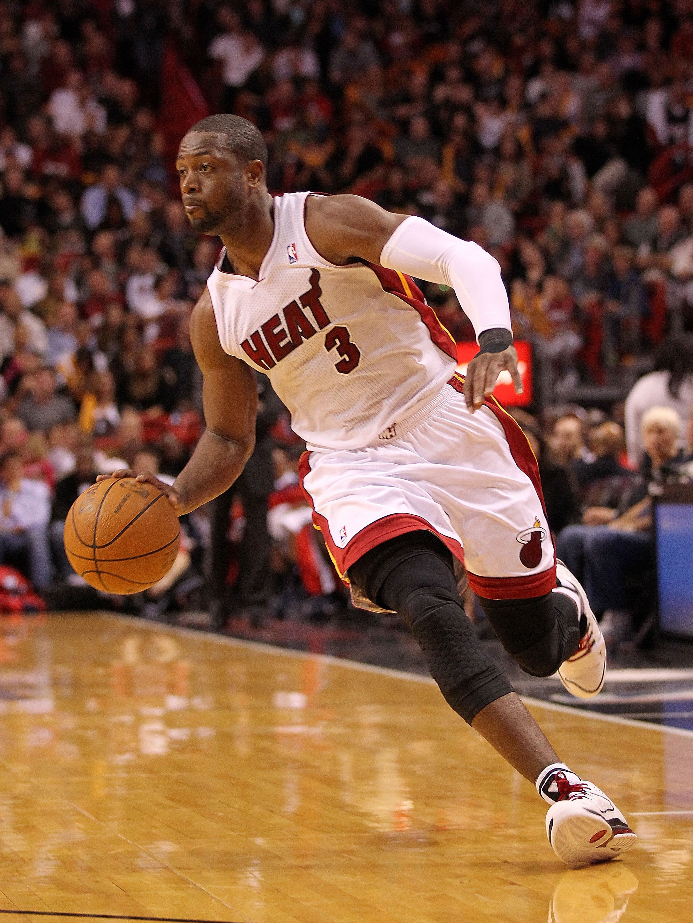 MIAMI, FL - DECEMBER 04:  Dwyane Wade #3 of the Miami Heat dribbles during a game against the Atlanta Hawks at American Airlines Arena on December 4, 2010 in Miami, Florida. NOTE TO USER: User expressly acknowledges and agrees that, by downloading and/or