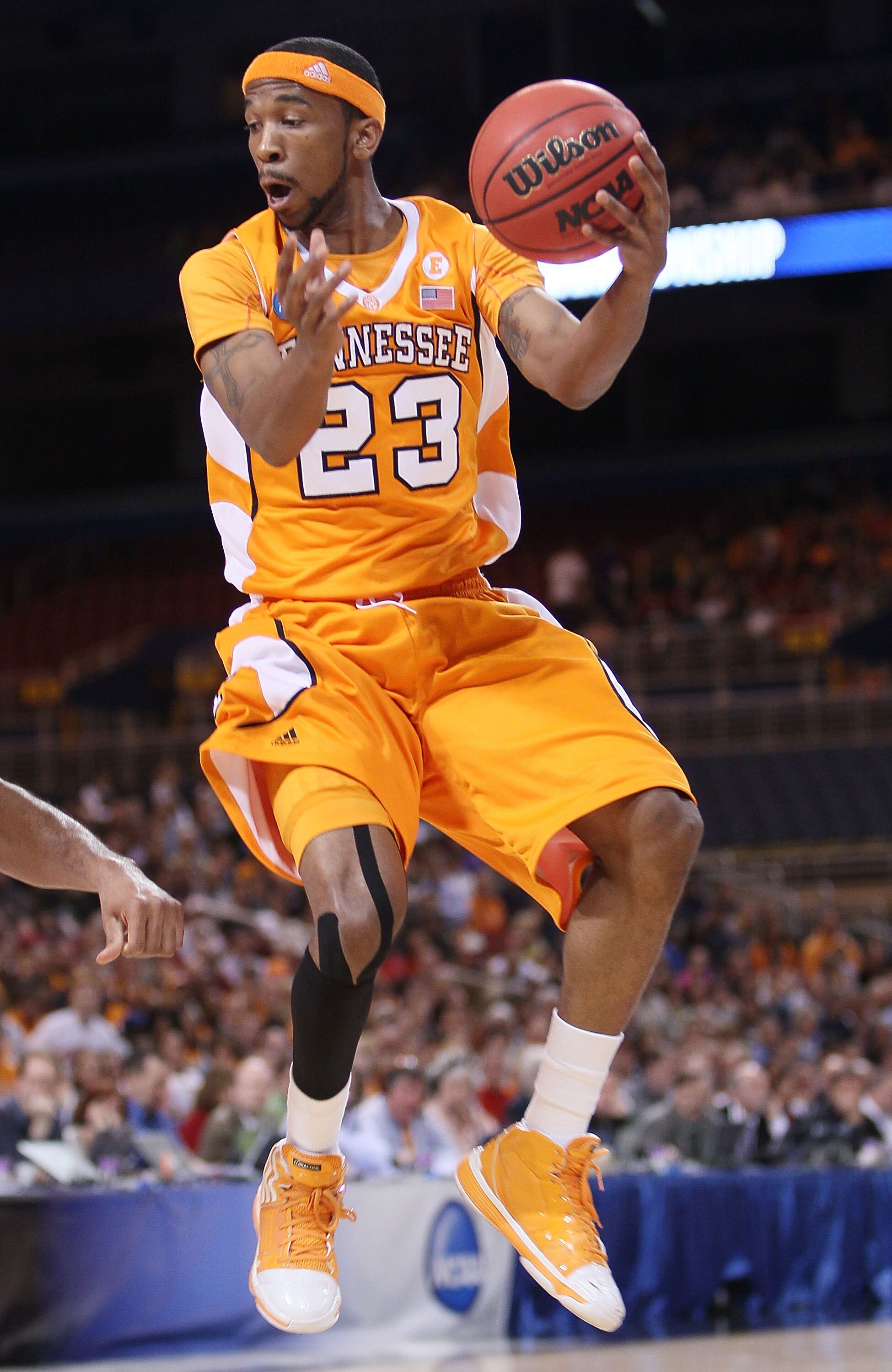 ST. LOUIS - MARCH 26:  Cameron Tatum #23 of the Tennessee Volunteers grabs the ball in the first half against the Ohio State Buckeyes during the midwest regional semifinal of the 2010 NCAA men's basketball tournament at the Edward Jones Dome on March 26,