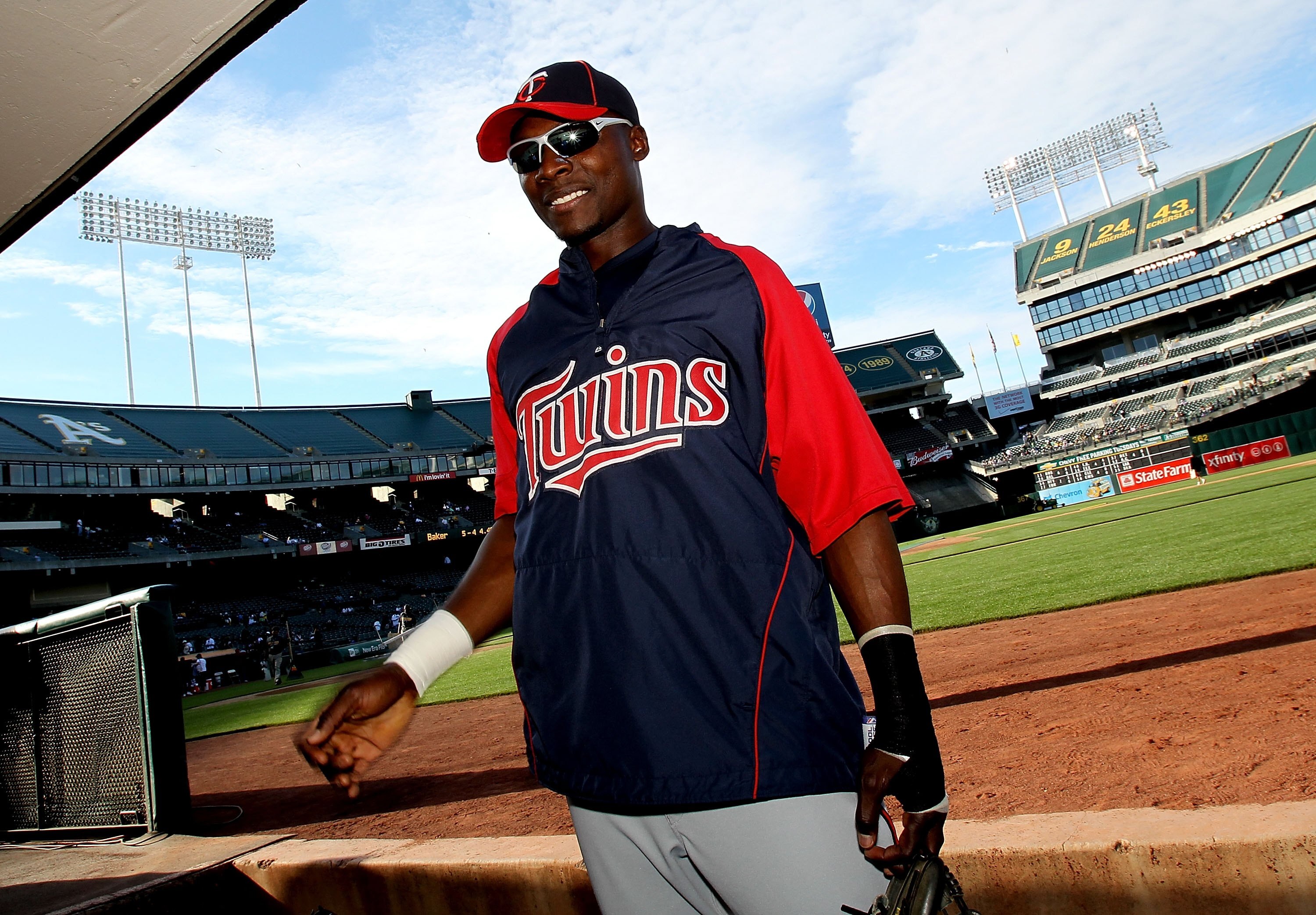 OAKLAND, CA - JUNE 04:  Orlando Hudson #1 of the Minnesota Twins signs autographs before his game against the Oakland Athletics at the Oakland-Alameda County Coliseum on June 4, 2010 in Oakland, California.  (Photo by Jed Jacobsohn/Getty Images)