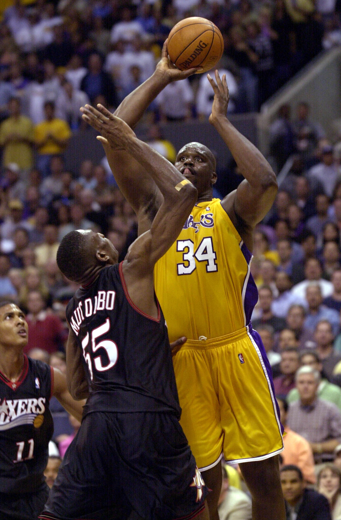 6 Jun 2001:  Shaquille O''Neal #34 of the Los Angeles Lakers puts a shot up over Dikembe Mutombo #55 of the Philadelphia 76ers in game one of the NBA Finals at Staples Center in Los Angeles, California.  The 76ers won 107-101.  DIGITAL IMAGE.  Mandatory C