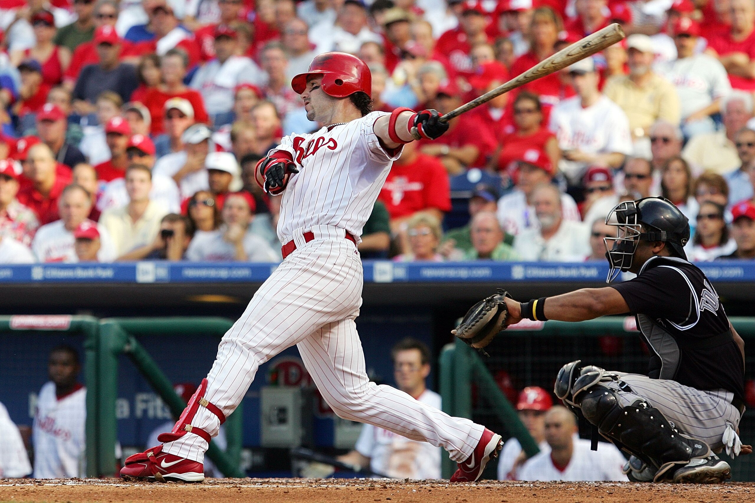 PHILADELPHIA - OCTOBER 03:  Aaron Rowand #33 of the Philadelphia Phillies hits a solo home run in the fifth inning against the Colorado Rockies during Game One of the National League Divisional Series at Citizens Bank Park on October 3, 2007 in Philadelph