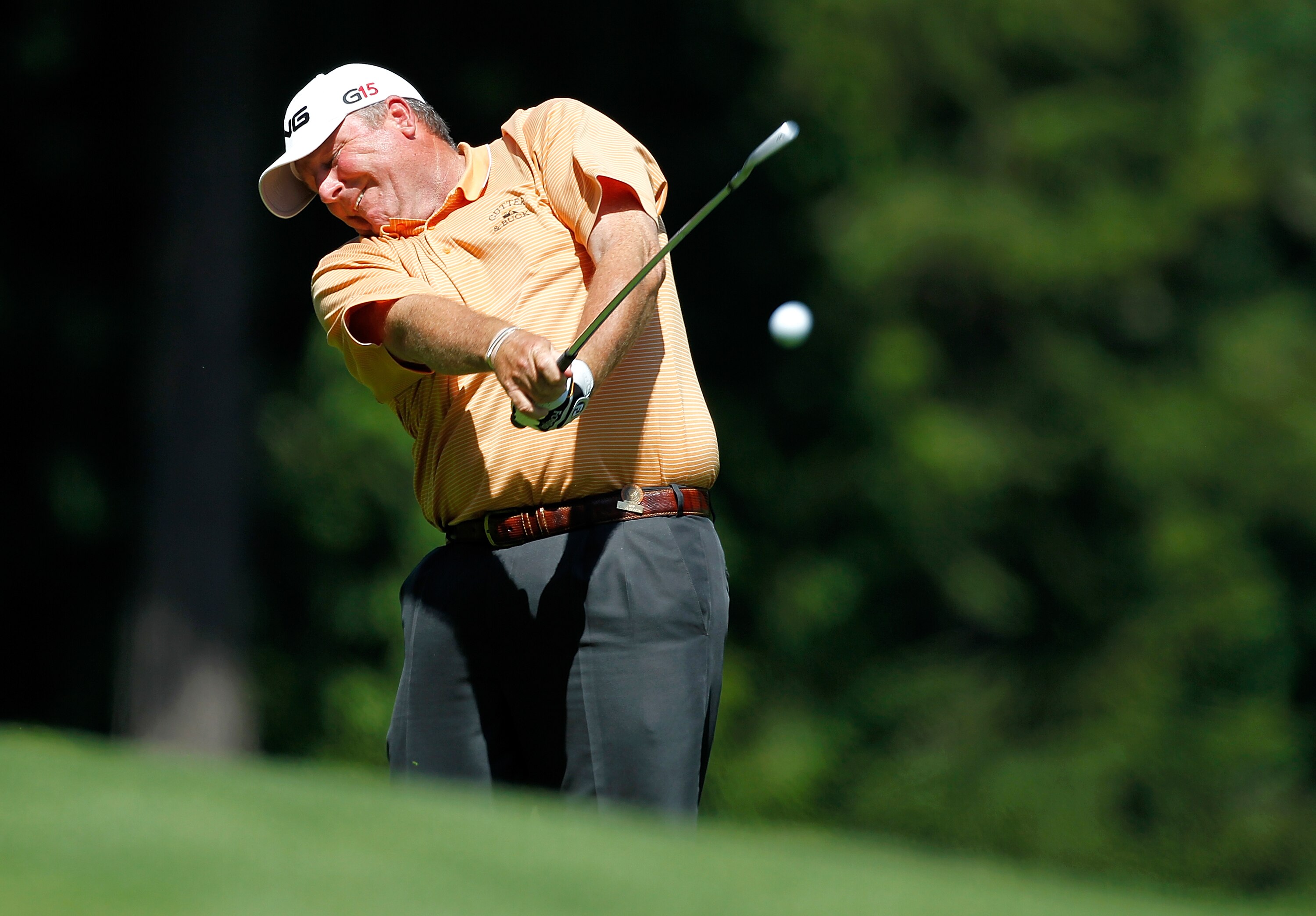 SAMMAMISH, WA - JULY 30:  Mark Calcavecchia hits his second shot on the 18th hole during the second round of the U.S. Senior Open Championship on July 30, 2010 at Sahalee Country Club in Sammamish, Washington..  (Photo by Jonathan Ferrey/Getty Images)