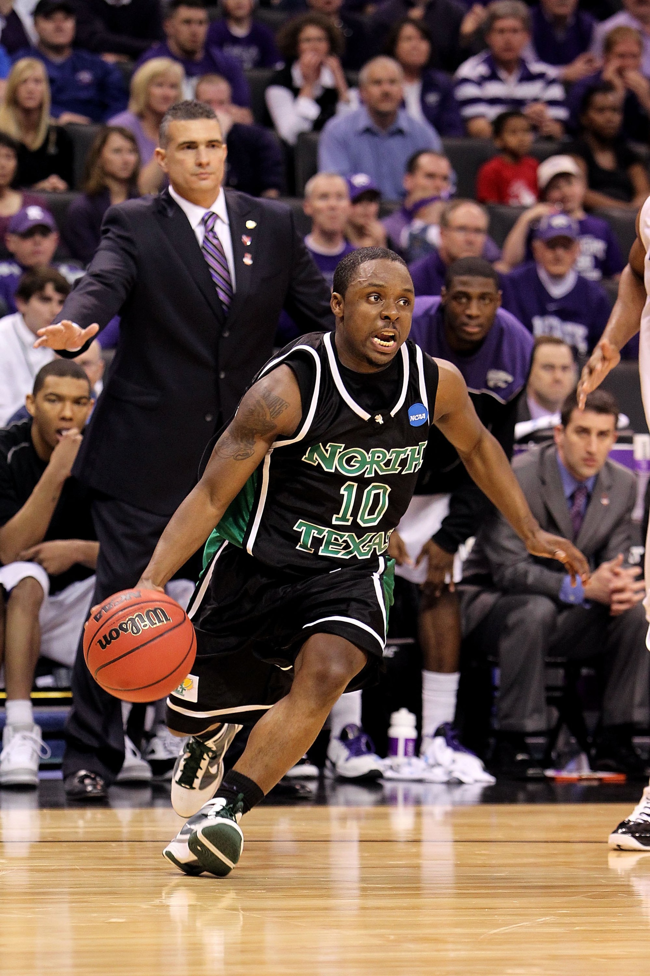 OKLAHOMA CITY - MARCH 18:  Josh White #10 of the North Texas Mean Green drives against the Kansas State Wildcats during the first round of the 2010 NCAA men's basketball tournament at Ford Center on March 18, 2010 in Oklahoma City, Oklahoma.  (Photo by Ro