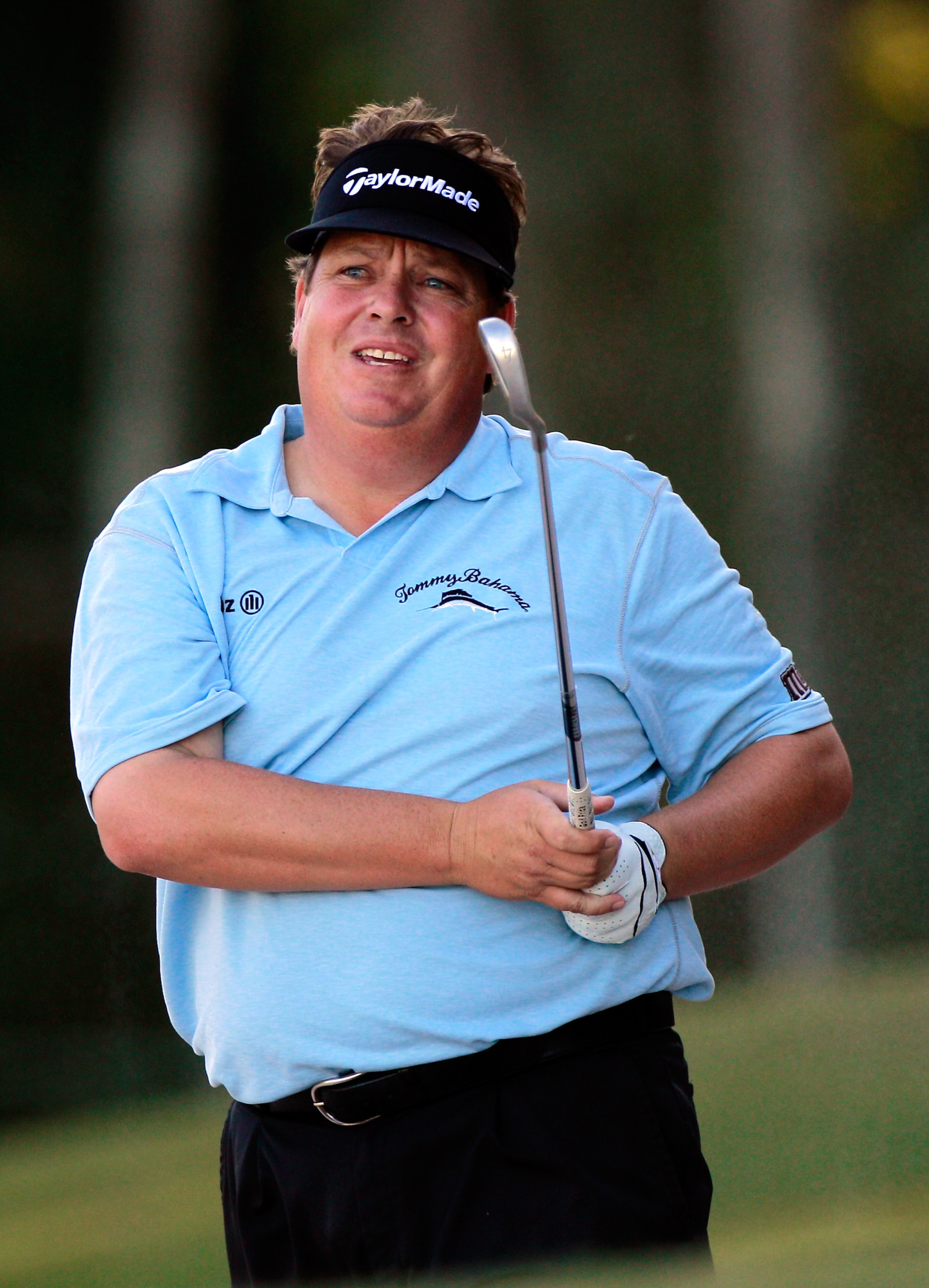 LAKE BUENA VISTA, FL - NOVEMBER 11:  Tim Herron plays a shot on the 18th hole during the first round of the Children's Miracle Network Classic at the Disney Palm and Magnolia courses on November 11, 2010 in Lake Buena Vista, Florida.  (Photo by Sam Greenw