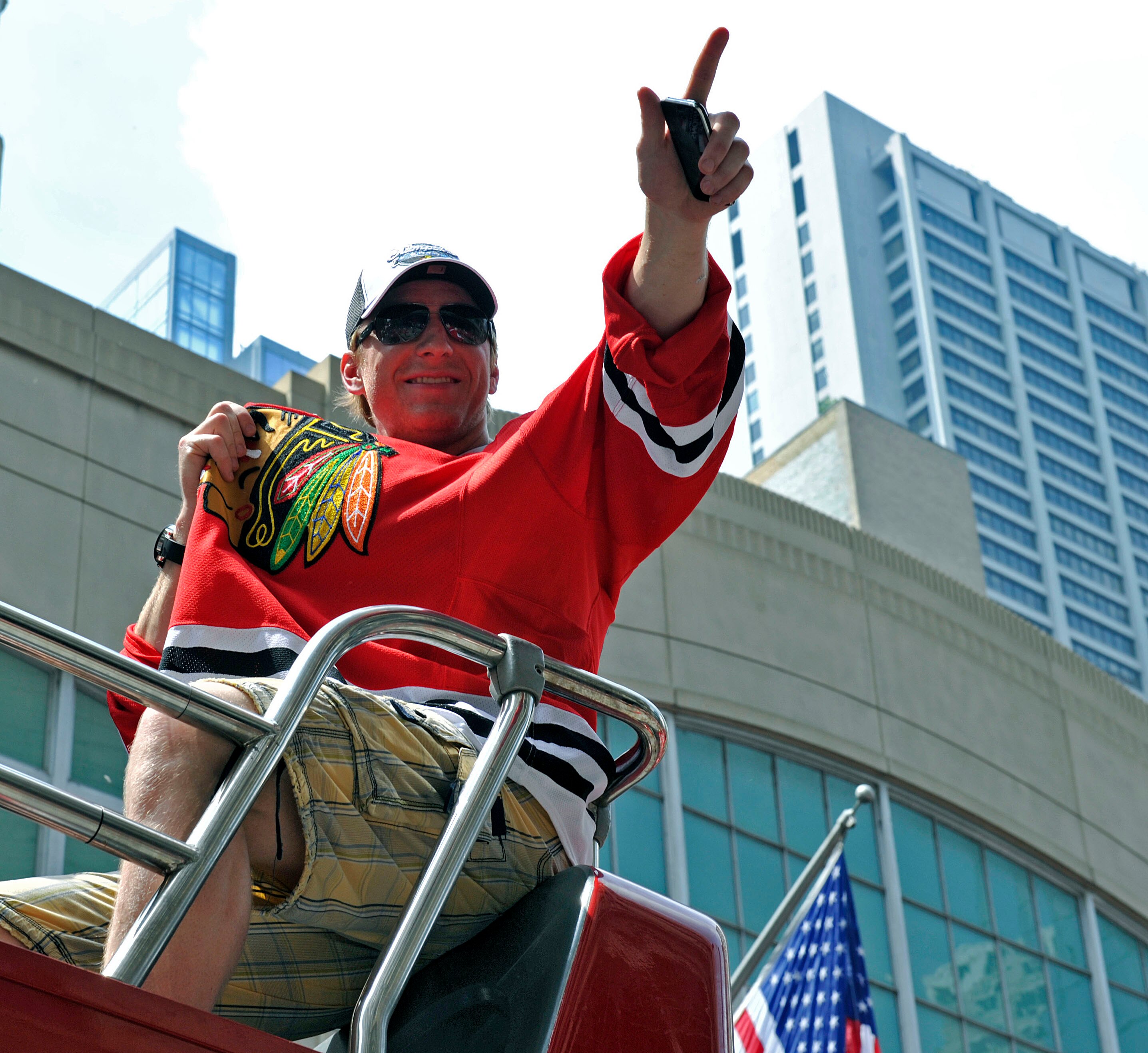 CHICAGO - JUNE 11: Marion Hossa of the Chicaco Blackhawks points to fans during the Stanley Cup victory parade on June 11, 2010 in Chicago, Illinois.  (Photo by Jim Prisching/Getty Images)