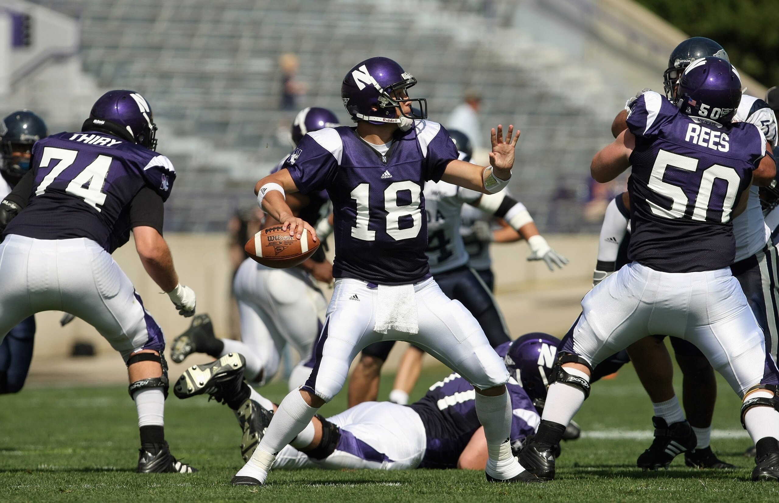 EVANSTON, IL - SEPTEMBER 8: Quarterback C.J. Bacher #18 of the Northwestern Wildcats passes the ball during the game against the Nevada Wolf Pack on September 8, 2007 at Ryan Field at Northwestern University in Evanston, Illinois. (Photo by Jonathan Danie EVANSTON, IL - SEPTEMBER 8: Quarterback C.J. Bacher #18 of the Northwestern Wildcats passes the ball during the game against the Nevada Wolf Pack on September 8, 2007 at Ryan Field at Northwestern University in Evanston, Illinois. (Photo by Jonathan Danie