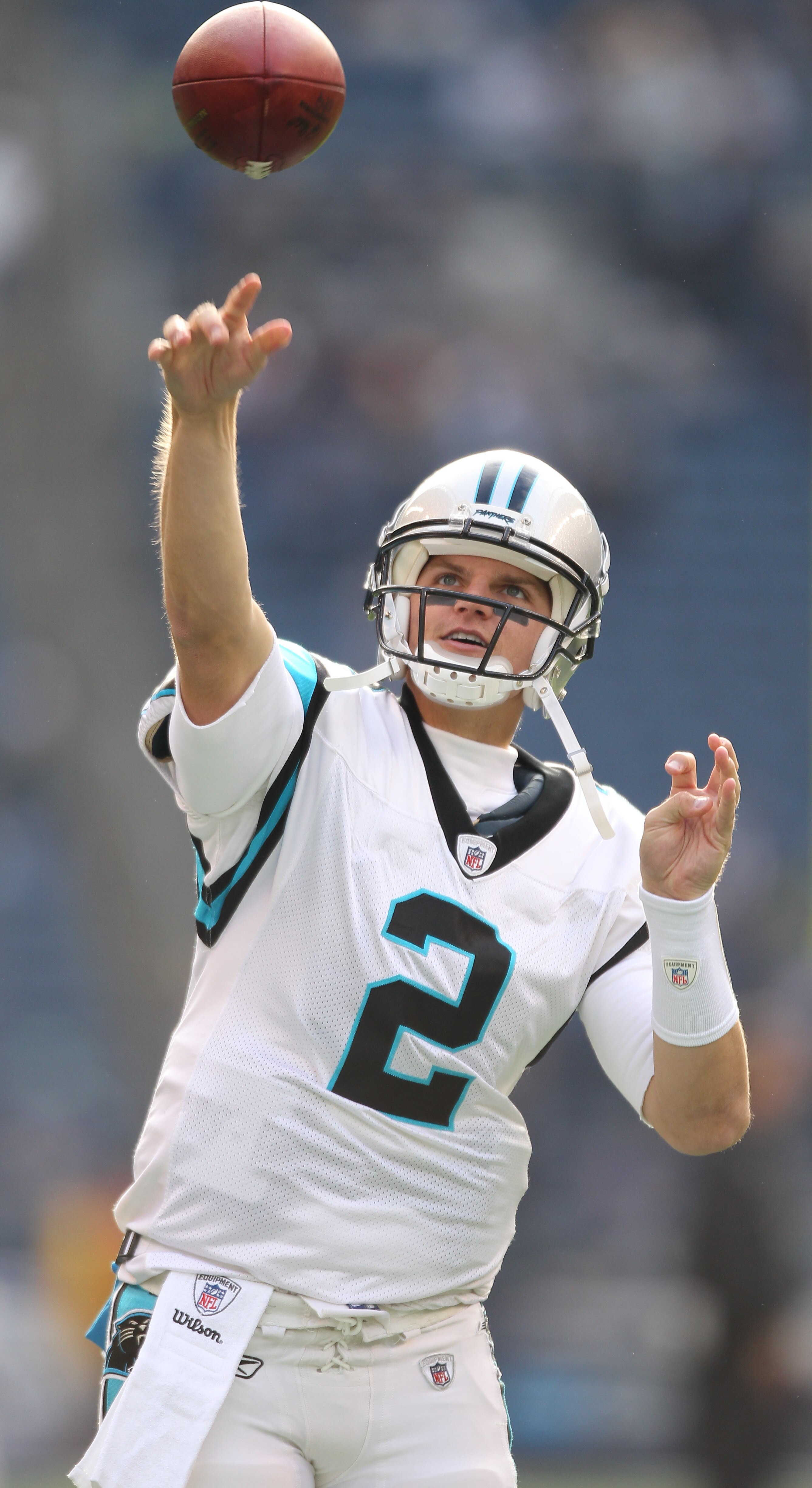 SEATTLE - DECEMBER 05:  Quarterback Jimmy Clausen #2 of the Carolina Panthers passes during warmups prior to the game against the Seattle Seahawks at Qwest Field on December 5, 2010 in Seattle, Washington. The Seahawks won, 31-14. (Photo by Otto Greule Jr