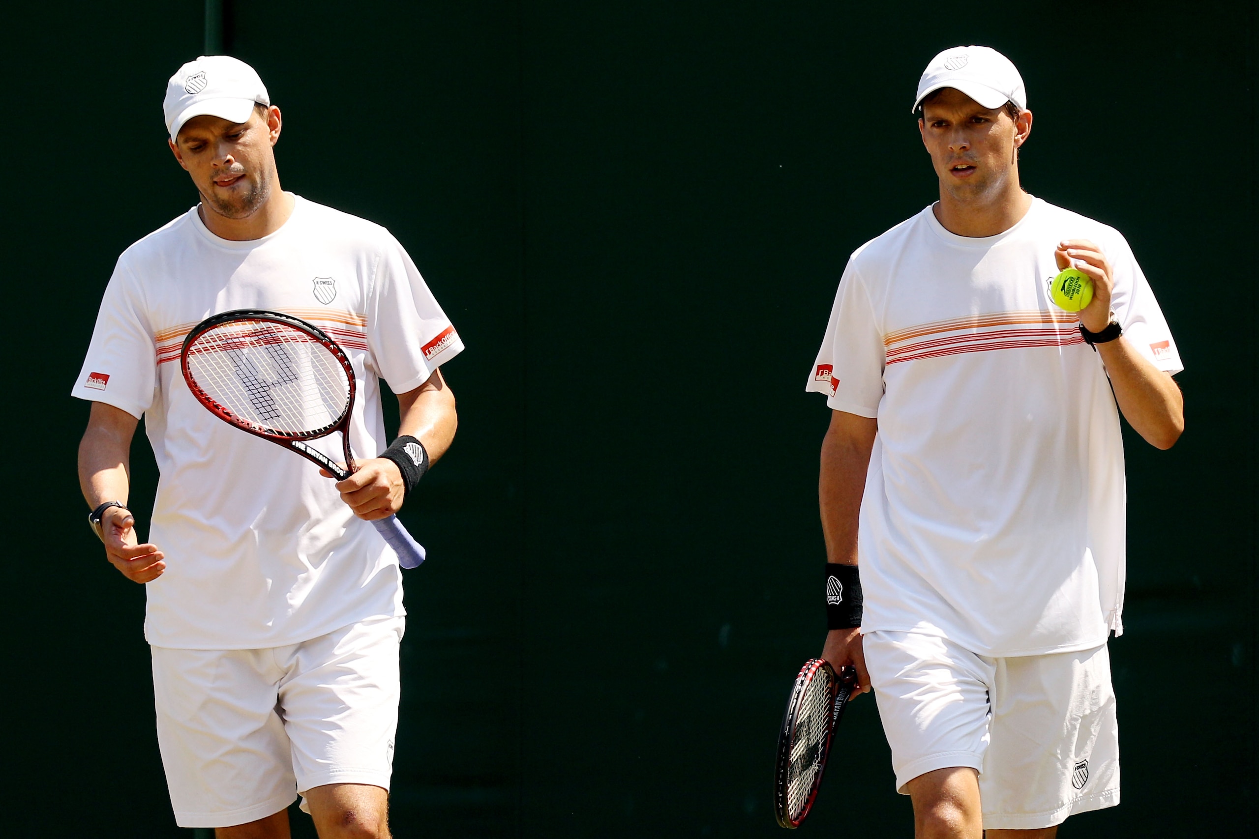 LONDON, ENGLAND - JUNE 28:  Bob Bryan (R) and Mike Bryan of USA in action against Colin Fleming and Kenneth Skupski of Great Britain on Day Seven of the Wimbledon Lawn Tennis Championships at the All England Lawn Tennis and Croquet Club on June 28, 2010 i
