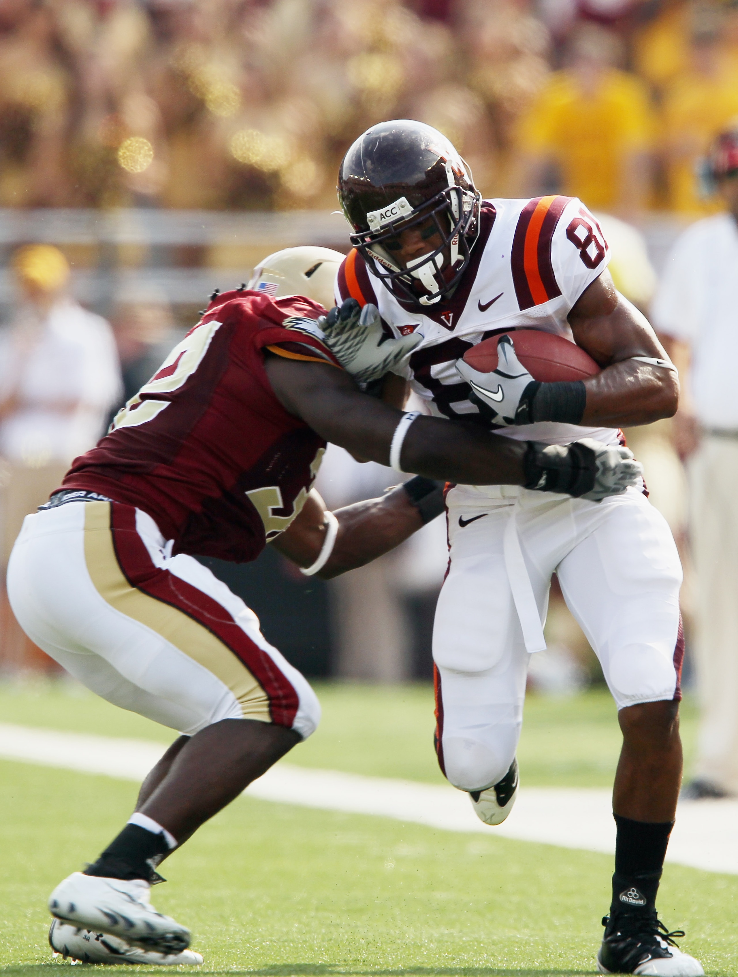 CHESTNUT HILL, MA - SEPTEMBER 25: Jarrett Boykin #81 of the Virginia Tech Hokies is tackled by Kevin Pierre-Louis #32 of the Boston College Eagles on September 25, 2010 at Alumni Stadium in Chestnut Hill, Massachusetts. Virginia Tech defeated Boston Coll CHESTNUT HILL, MA - SEPTEMBER 25: Jarrett Boykin #81 of the Virginia Tech Hokies is tackled by Kevin Pierre-Louis #32 of the Boston College Eagles on September 25, 2010 at Alumni Stadium in Chestnut Hill, Massachusetts. Virginia Tech defeated Boston Coll