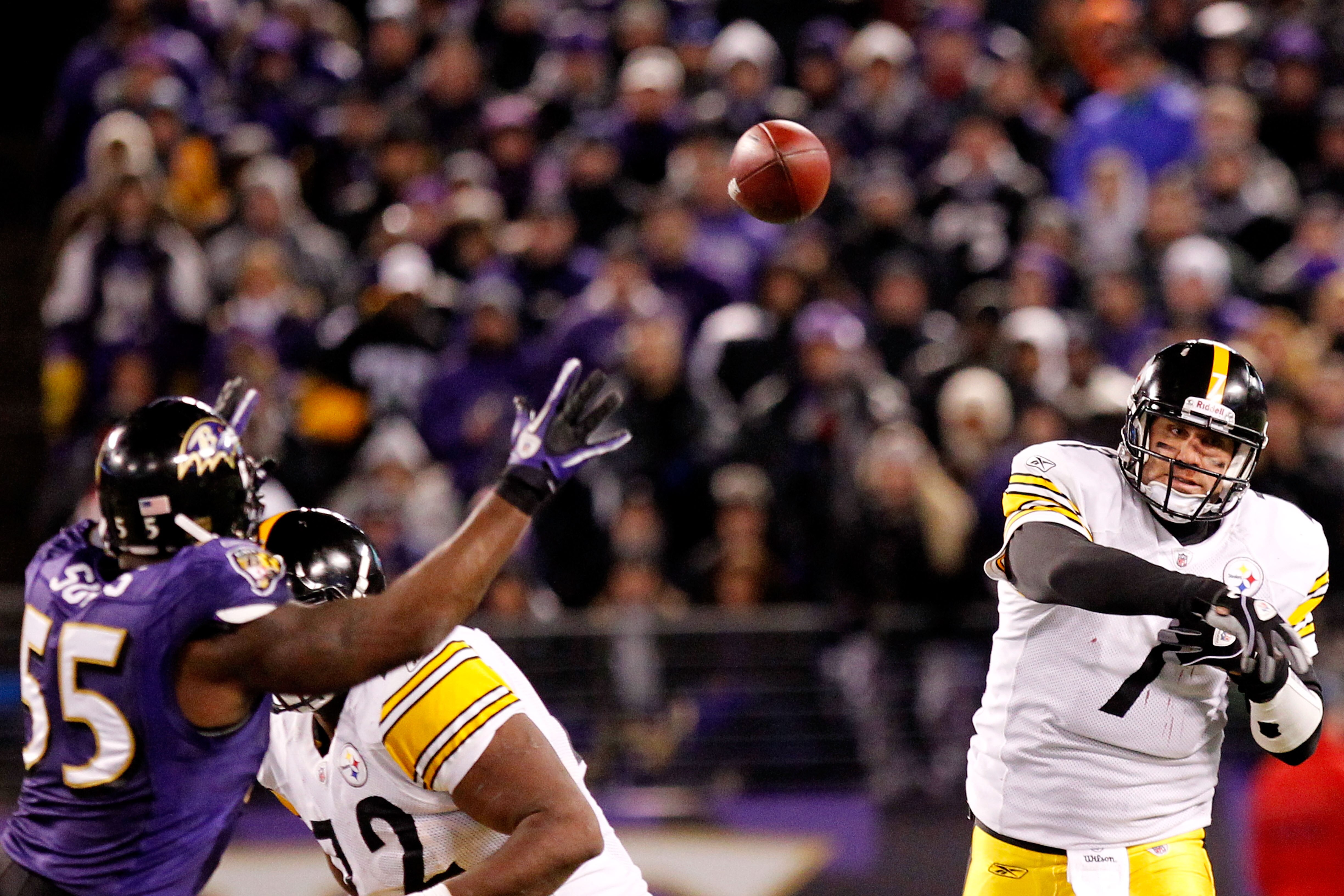BALTIMORE, MD - DECEMBER 05:  Quarterback Ben Roethlisberger #7 of the Pittsburgh Steelers throws a pass against linebacker Terrell Suggs #55 of the Baltimore Ravens during the second quarter of the game at M&T Bank Stadium on December 5, 2010 in Baltimor