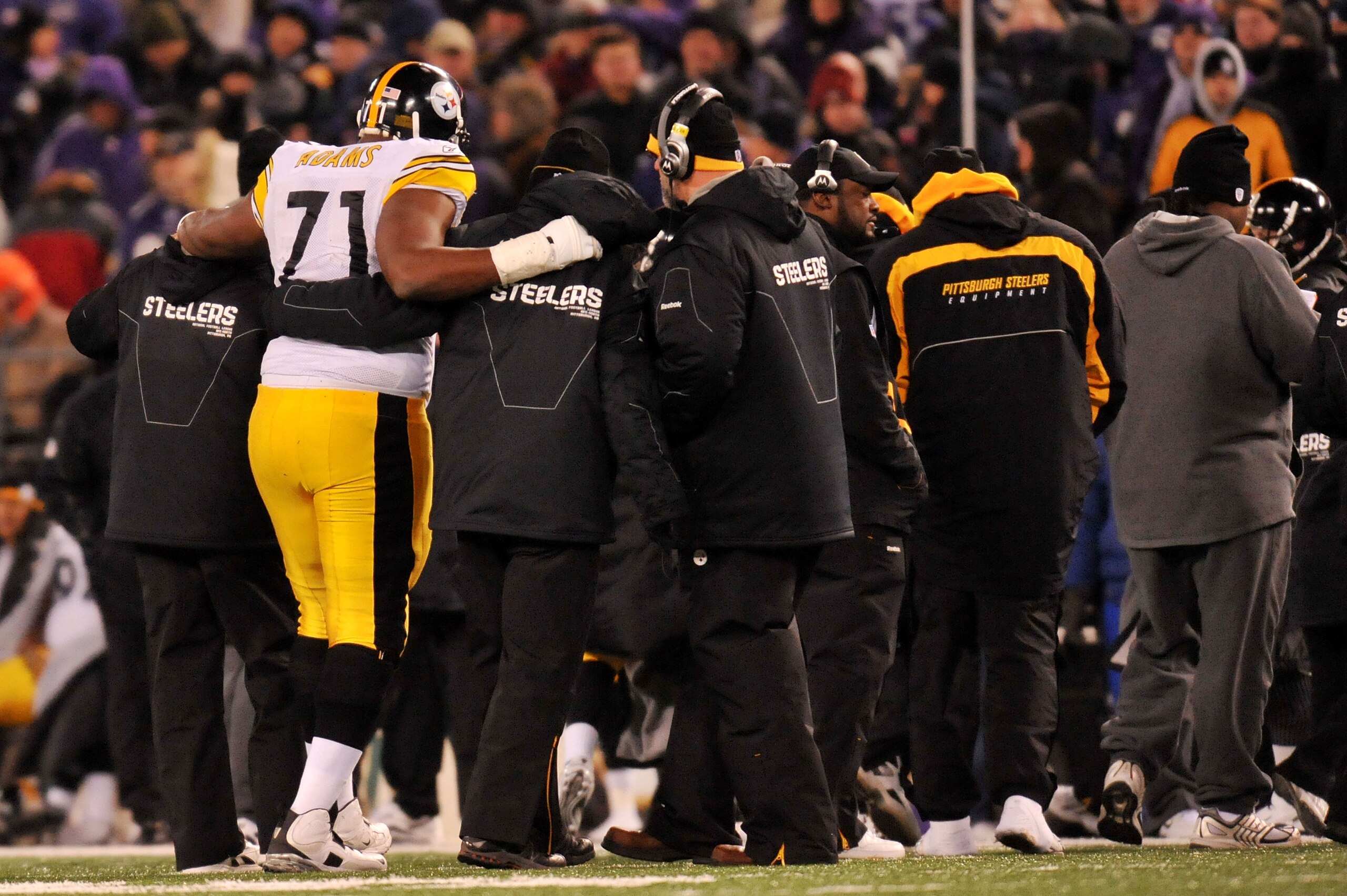 BALTIMORE, MD - DECEMBER 05:  Tackle Flozell Adams #71 of the Pittsburgh Steelers is helped off the field after an injury during the third quarter of the game against the Baltimore Ravens at M&T Bank Stadium on December 5, 2010 in Baltimore, Maryland.  (P