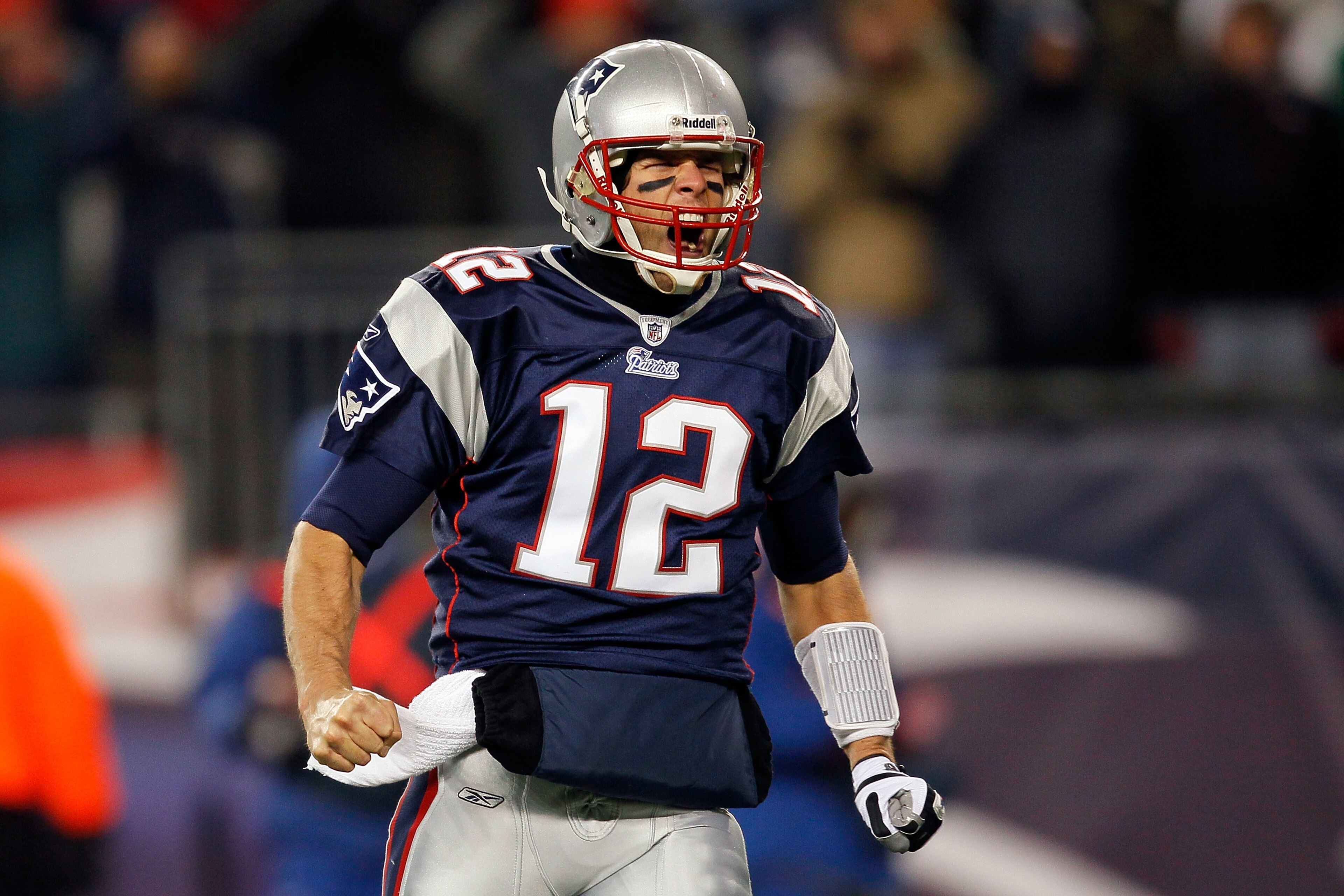 FOXBORO, MA - DECEMBER 06: Tom Brady #12 of the New England Patriots reacts after BenJarvus Green-Ellis scored a 1-yard rushing touchdown in the first quarter against the New York Jets at Gillette Stadium on December 6, 2010 in Foxboro, Massachusetts. ( FOXBORO, MA - DECEMBER 06: Tom Brady #12 of the New England Patriots reacts after BenJarvus Green-Ellis scored a 1-yard rushing touchdown in the first quarter against the New York Jets at Gillette Stadium on December 6, 2010 in Foxboro, Massachusetts. (