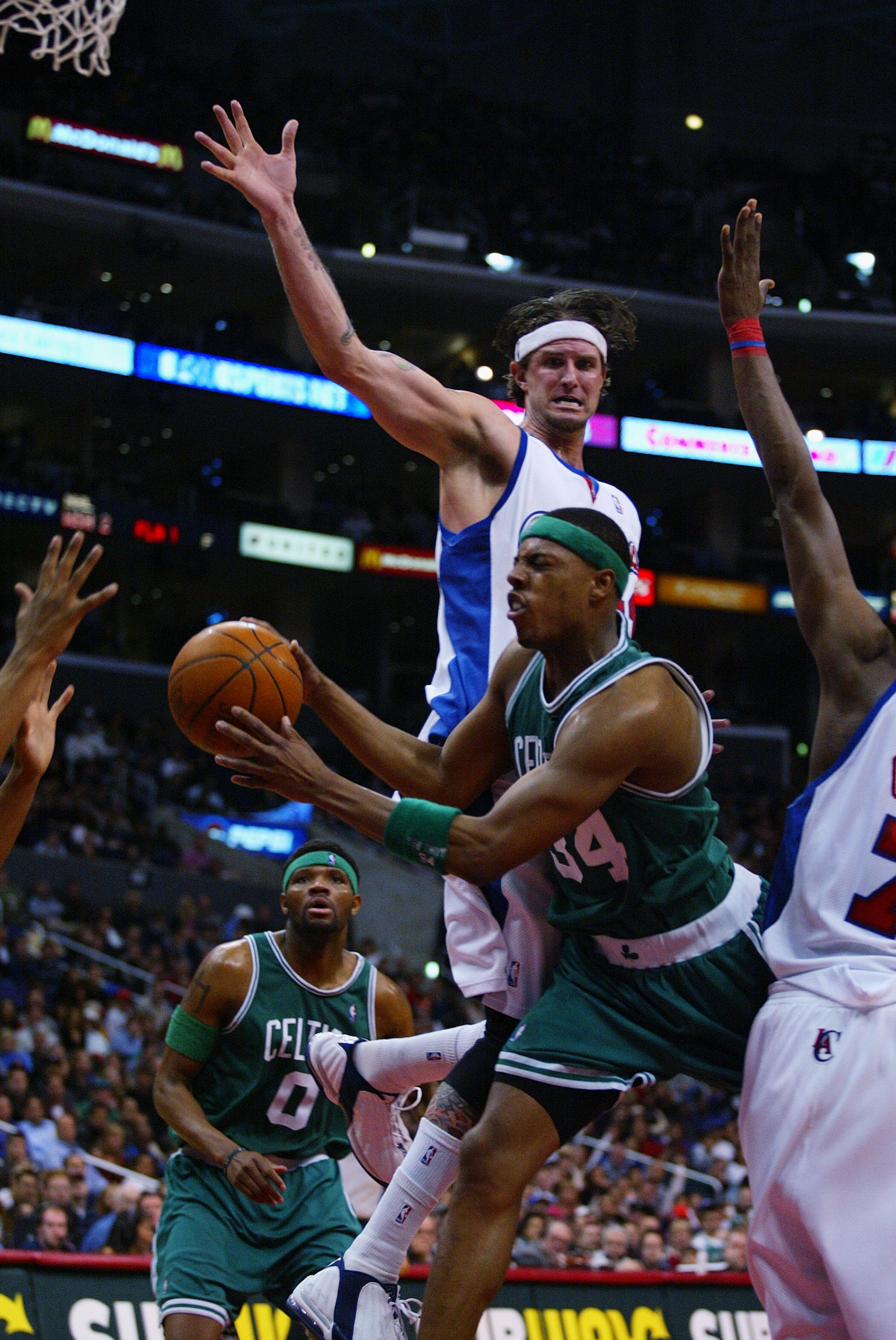LOS ANGELES - FEBRUARY 15:  Paul Pierce #34 of the Boston Celtics drives to the basket past Cherokee Parks #44 of the Los Angeles Clippers during the NBA game at Staples Center on February 15, 2003 in Los Angeles, California.  The Celtics won 92-84.  NOTE