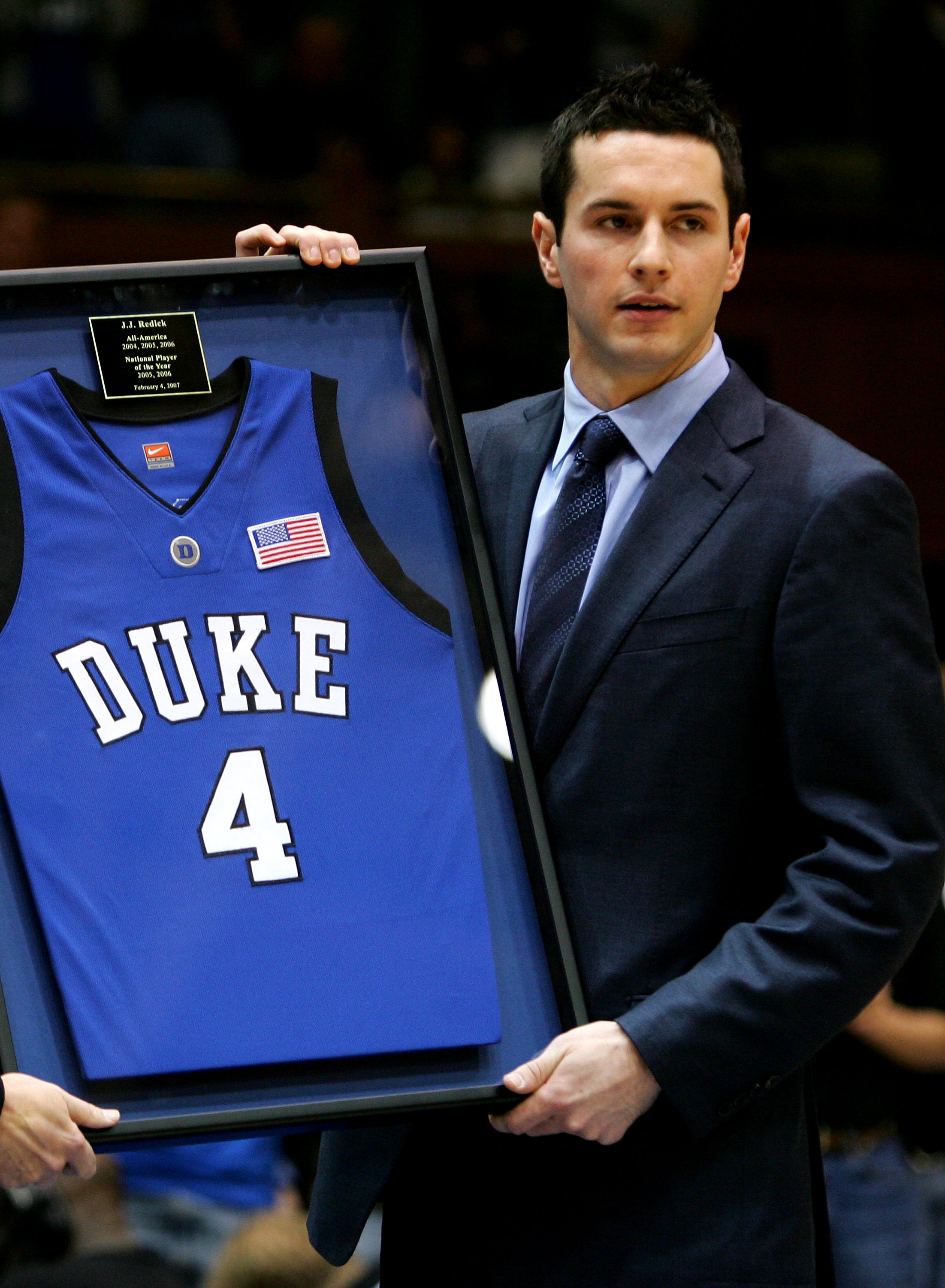DURHAM, NC - FEBRUARY 04:  Former Duke Blue Devil J.J. Reddick holds his jersey after it was retired during halftime of their game against the Florida State Seminoles at Cameron Indoor Stadium on February 4, 2007 in Durham, North Carolina.  (Photo by Stre