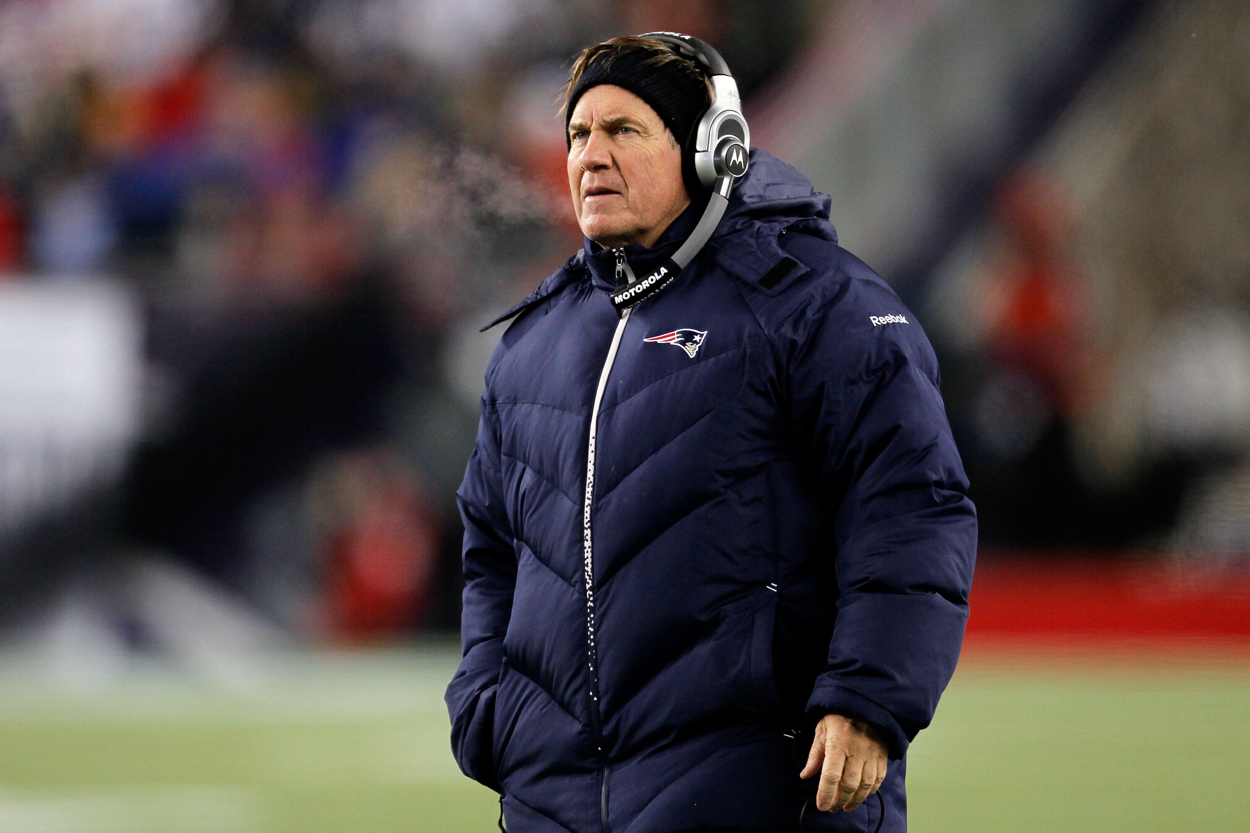 FOXBORO, MA - DECEMBER 06: Head coach Bill Belichick of the New England Patriots looks on in the first half against the New York Jets at Gillette Stadium on December 6, 2010 in Foxboro, Massachusetts. (Photo by Jim Rogash/Getty Images) FOXBORO, MA - DECEMBER 06: Head coach Bill Belichick of the New England Patriots looks on in the first half against the New York Jets at Gillette Stadium on December 6, 2010 in Foxboro, Massachusetts. (Photo by Jim Rogash/Getty Images)