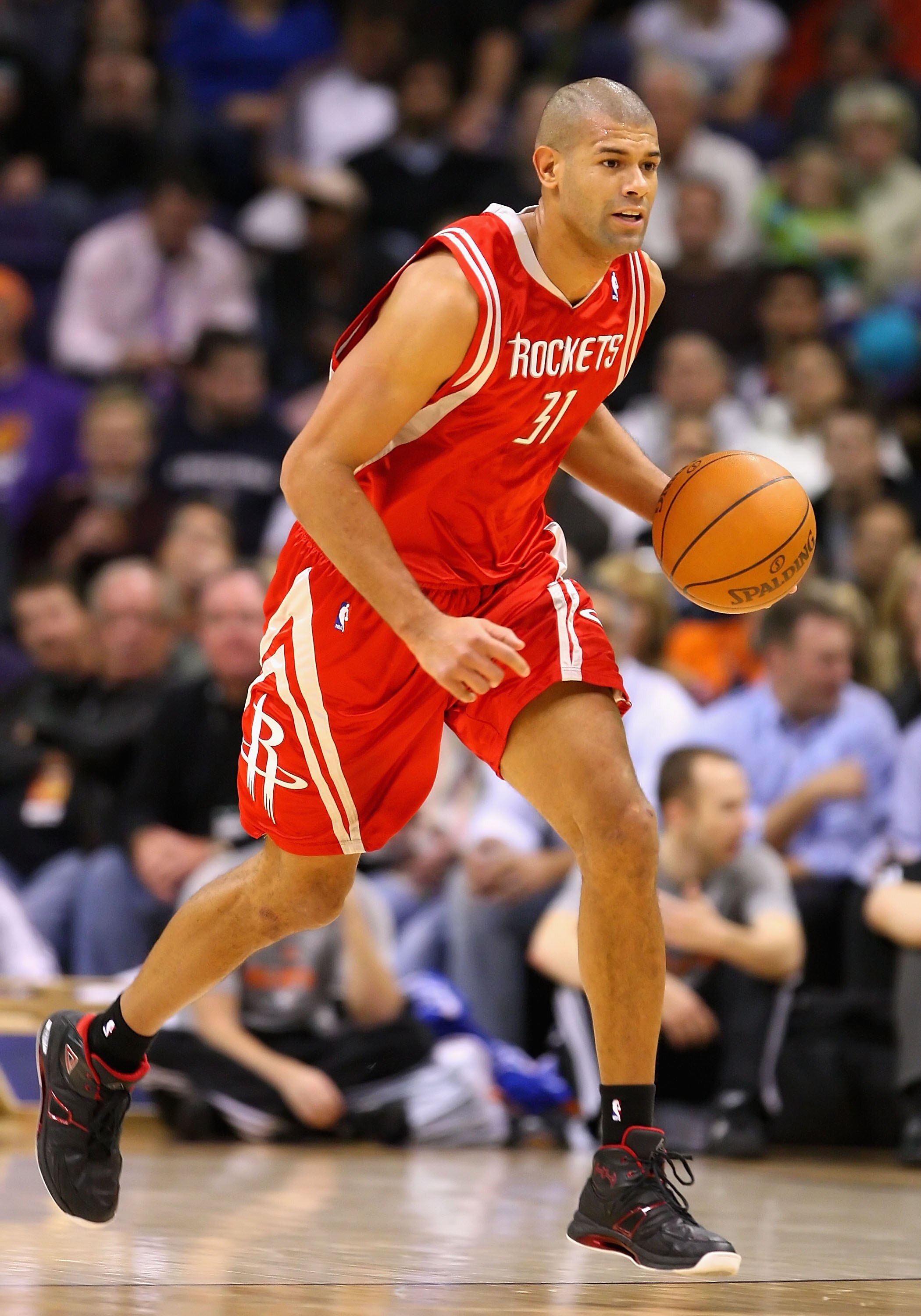 PHOENIX - JANUARY 06:  Shane Battier #31 of the Houston Rockets handles the ball during the NBA game against the Phoenix Suns at US Airways Center on January 6, 2010 in Phoenix, Arizona. The Suns defeated the Rockets 118-110.  NOTE TO USER: User expressly