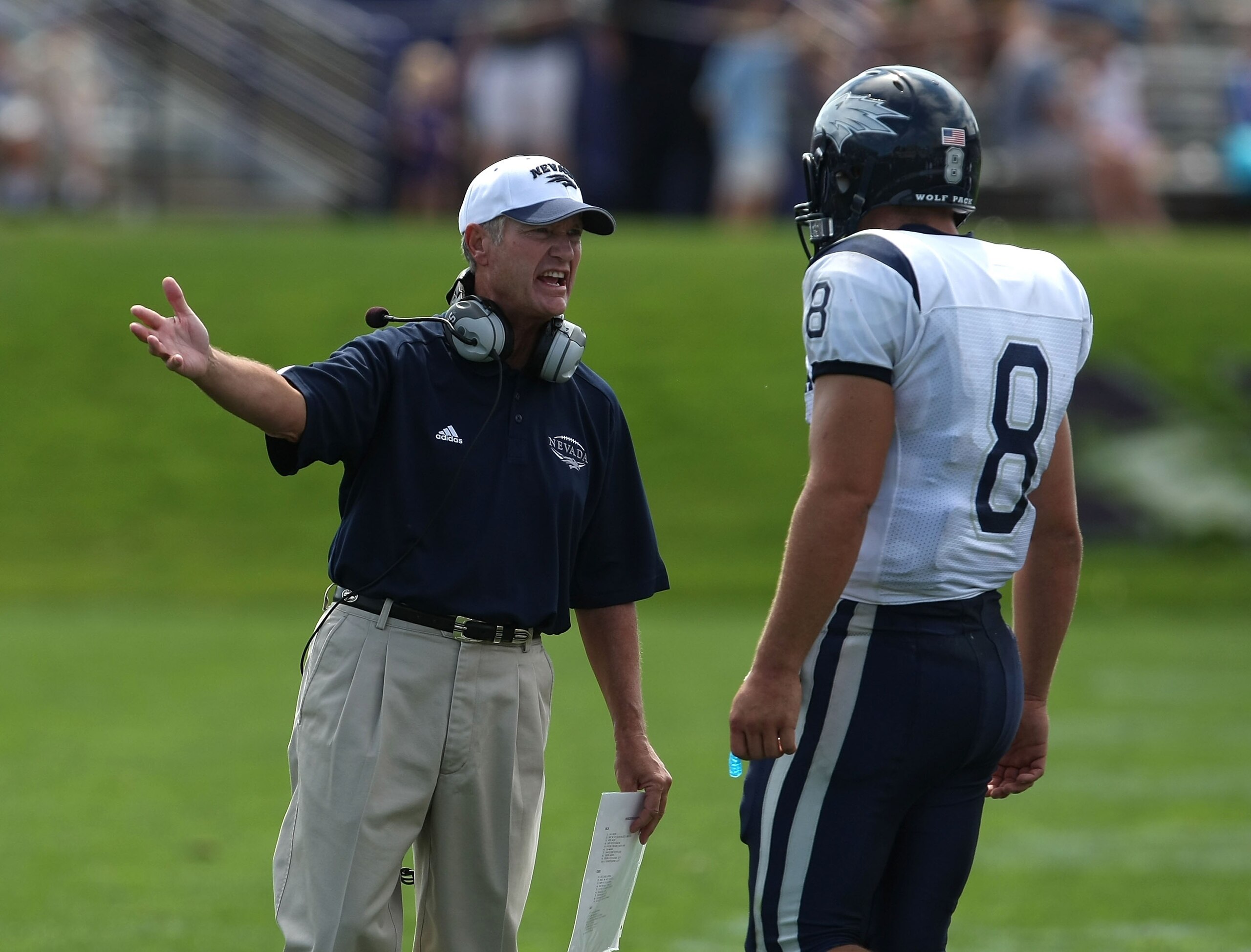 EVANSTON, IL - SEPTEMBER 08: Head coach Chris Ault of the Nevada Wolf Pack has words with quarterback Nick Graziano #8 during a game against the Northwestern Wildcats on September 8, 2007 at Ryan Field at Northwestern University in Evanston, Illinois. (Ph EVANSTON, IL - SEPTEMBER 08: Head coach Chris Ault of the Nevada Wolf Pack has words with quarterback Nick Graziano #8 during a game against the Northwestern Wildcats on September 8, 2007 at Ryan Field at Northwestern University in Evanston, Illinois. (Ph