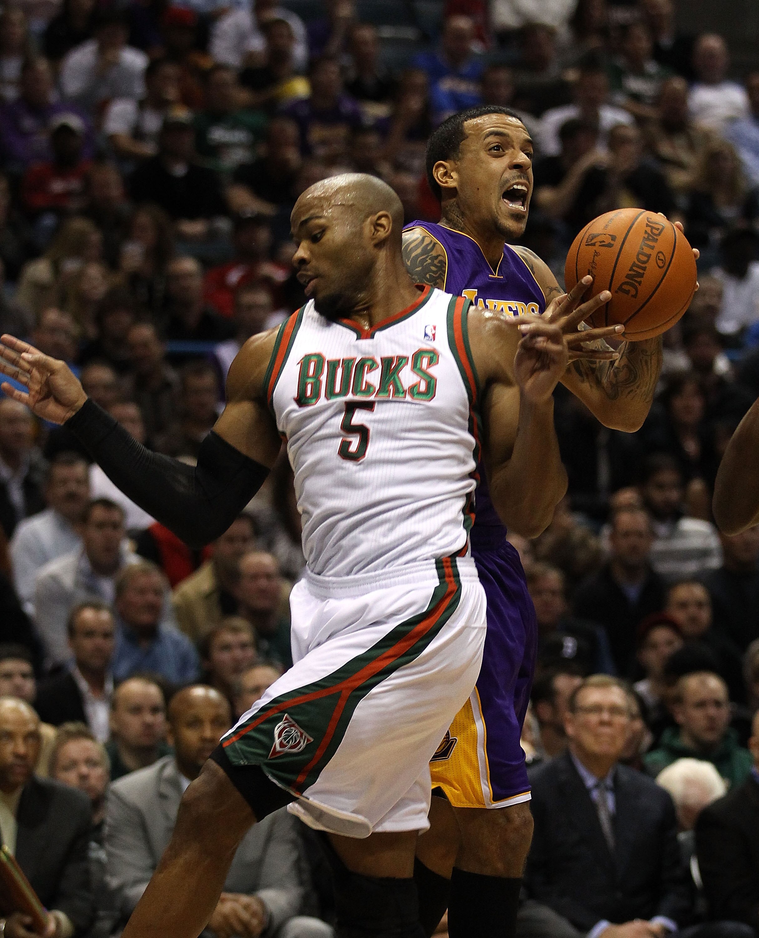 MILWAUKEE - NOVEMBER 16: Corey Maggette #5 of the Milwaukee Bucks fouls Matt Barnes #9 of the Los Angeles Lakers at the Bradley Center on November 16, 2010 in Milwaukee, Wisconsin. NOTE TO USER: User expressly acknowledges and agrees that, by downloading