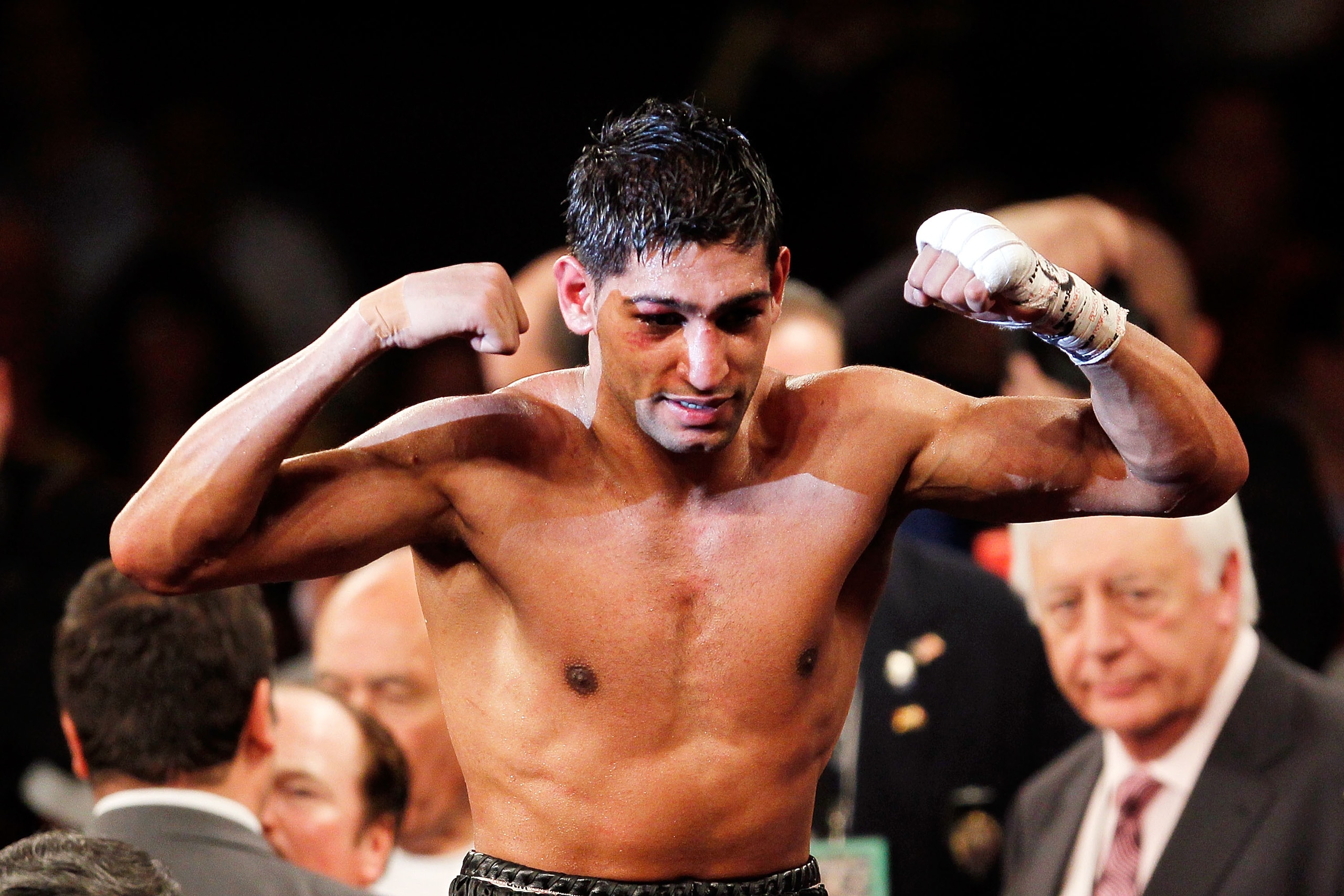 NEW YORK - MAY 15:  Amir Khan of Great Britain celebrates after defeating Paulie Malignaggi by TKO in the 11th round of his WBA light welterweight title fight at Madison Square Garden on May 15, 2010 in New York City.  (Photo by Chris Trotman/Getty Images
