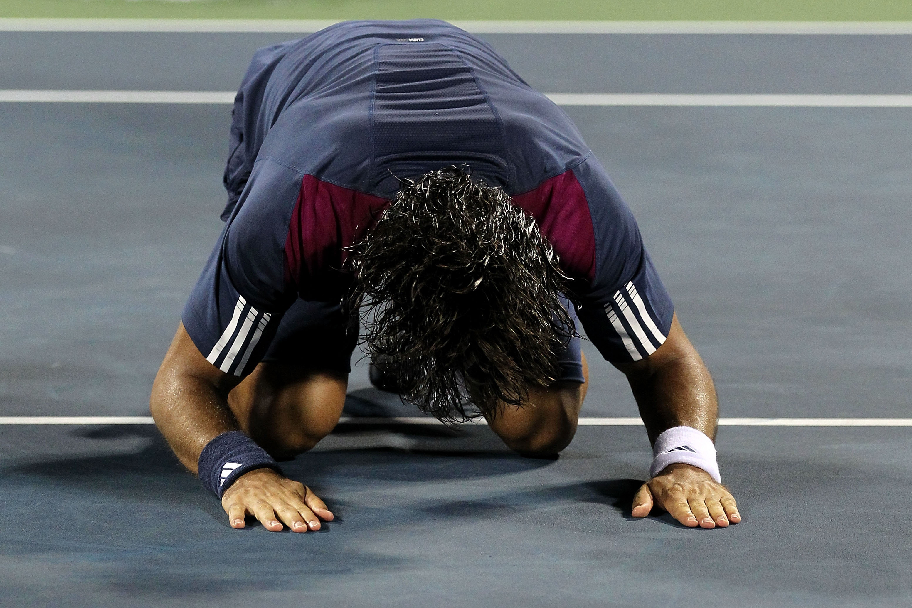 NEW YORK - SEPTEMBER 07:  Fernando Verdasco of Spain celebrates after he won his men's singles match agianst David Ferrer of Spain on day nine of the 2010 U.S. Open at the USTA Billie Jean King National Tennis Center on September 7, 2010 in the Flushing n
