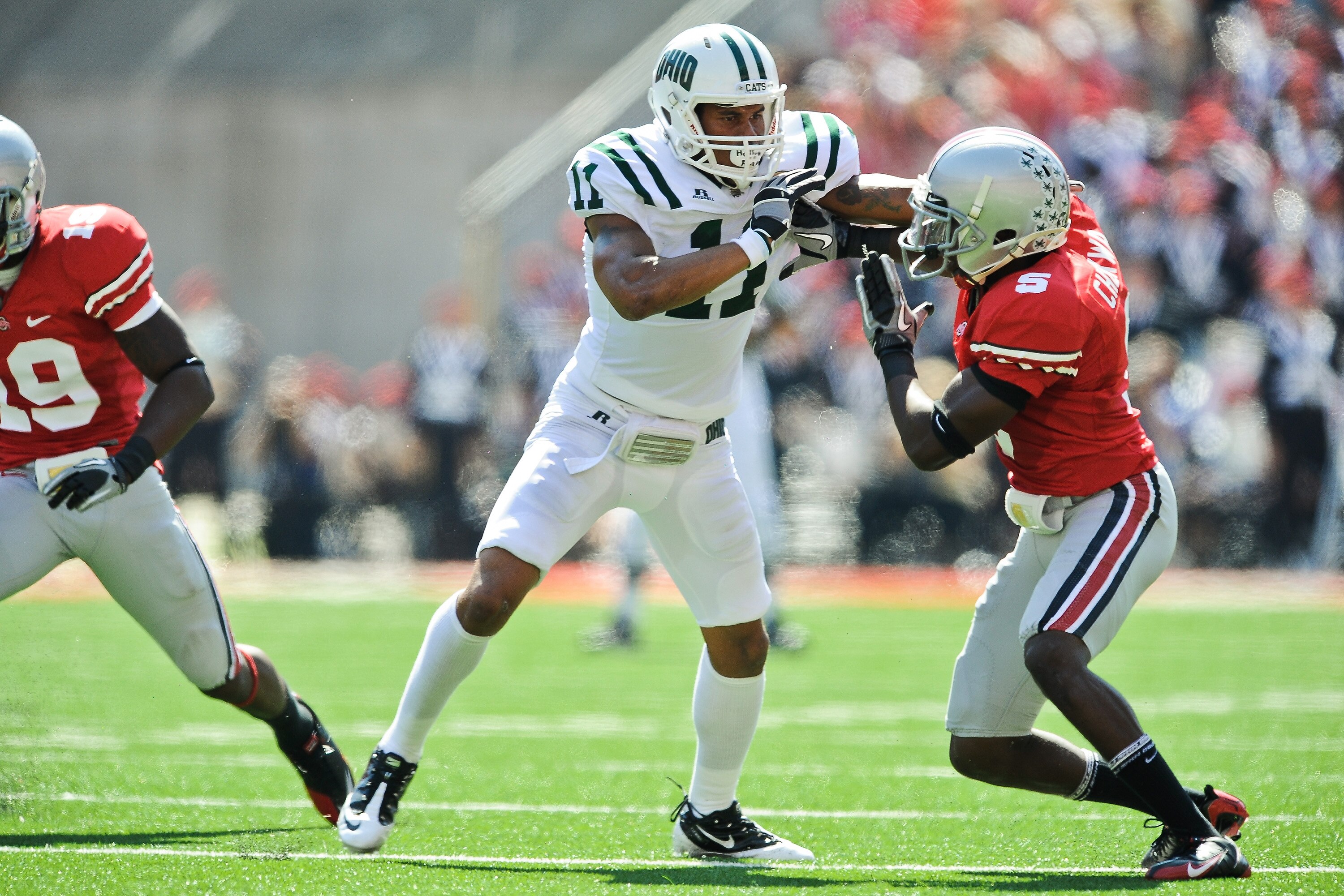 COLUMBUS, OH - SEPTEMBER 18:  Terrence McCrae #11 of the Ohio Bobcats blocks Chimdi Chekwa #5 of the Ohio State Buckeyes at Ohio Stadium on September 18, 2010 in Columbus, Ohio.  (Photo by Jamie Sabau/Getty Images)