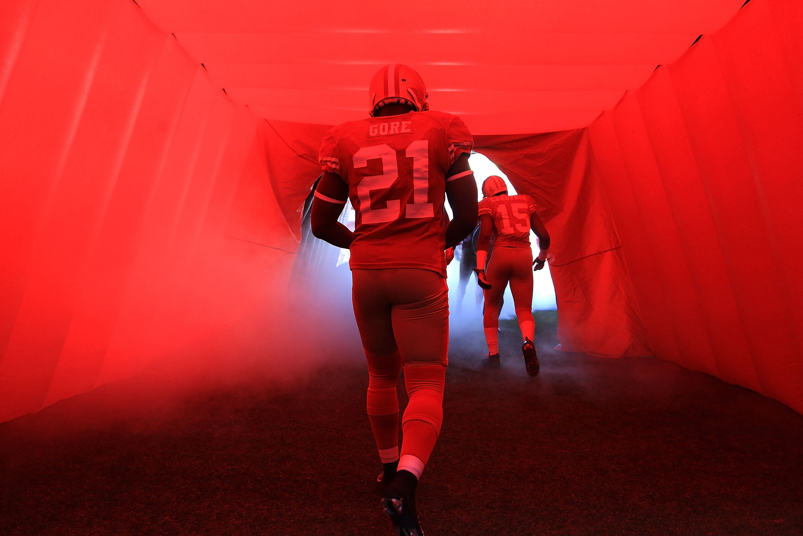 SAN FRANCISCO - NOVEMBER 14:  Frank Groe #21 of the San Francisco 49ers enters the field for their game against the St. Louis Rams at Candlestick Park on November 14, 2010 in San Francisco, California.  (Photo by Ezra Shaw/Getty Images)