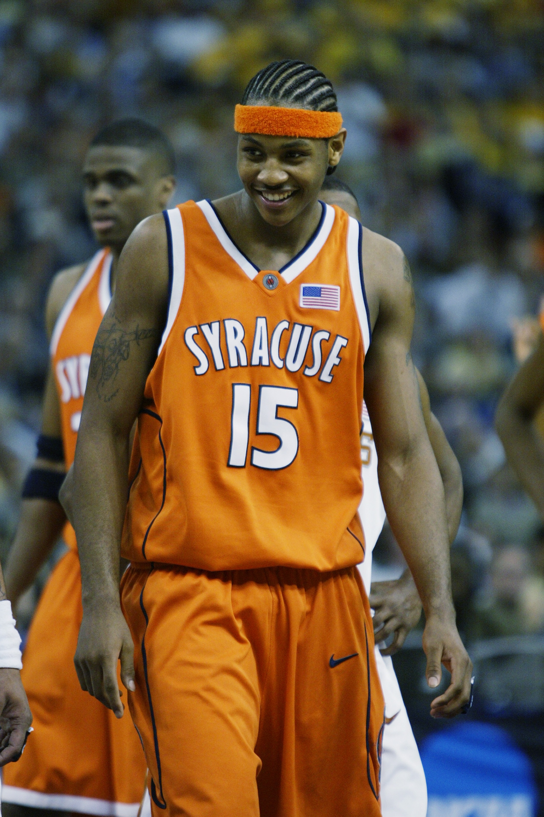 NEW ORLEANS - APRIL 5:  Carmelo Anthony #15 of the Syracuse University Orangeman smiles during the semifinal round of the NCAA Final Four Tournament against the University of Texas at Austin Longhorns at the Louisiana Superdome on April 5, 2003 in New Orl