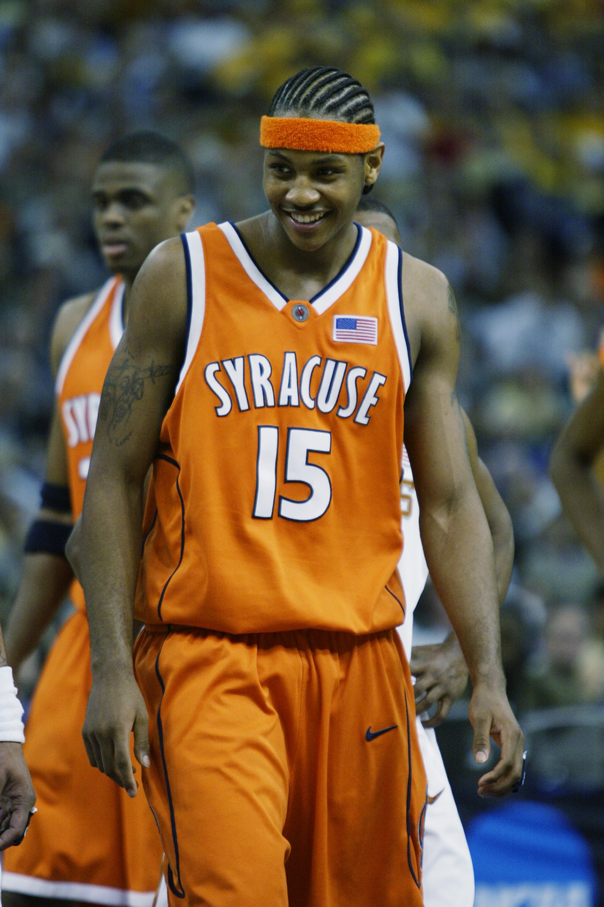 NEW ORLEANS - APRIL 5:  Carmelo Anthony #15 of the Syracuse University Orangeman smiles during the semifinal round of the NCAA Final Four Tournament against the University of Texas at Austin Longhorns at the Louisiana Superdome on April 5, 2003 in New Orl