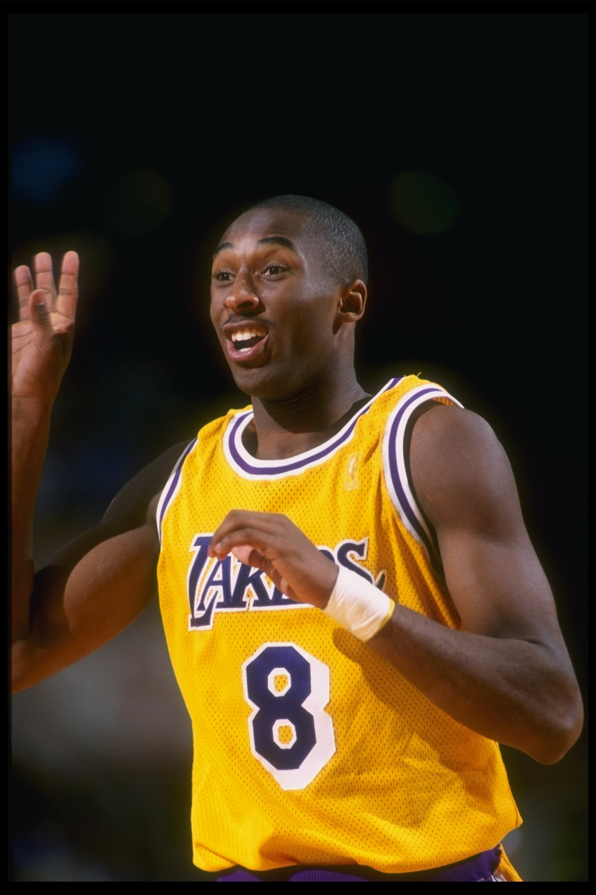 16 Oct 1996:  Guard Kobe Bryant of the Los Angeles Lakers celebrates during a game against the Dallas Mavericks at Selland Arena in Fresno, California.  The Lakers won the game, 90-80. Mandatory Credit: Todd Warshaw  /Allsport