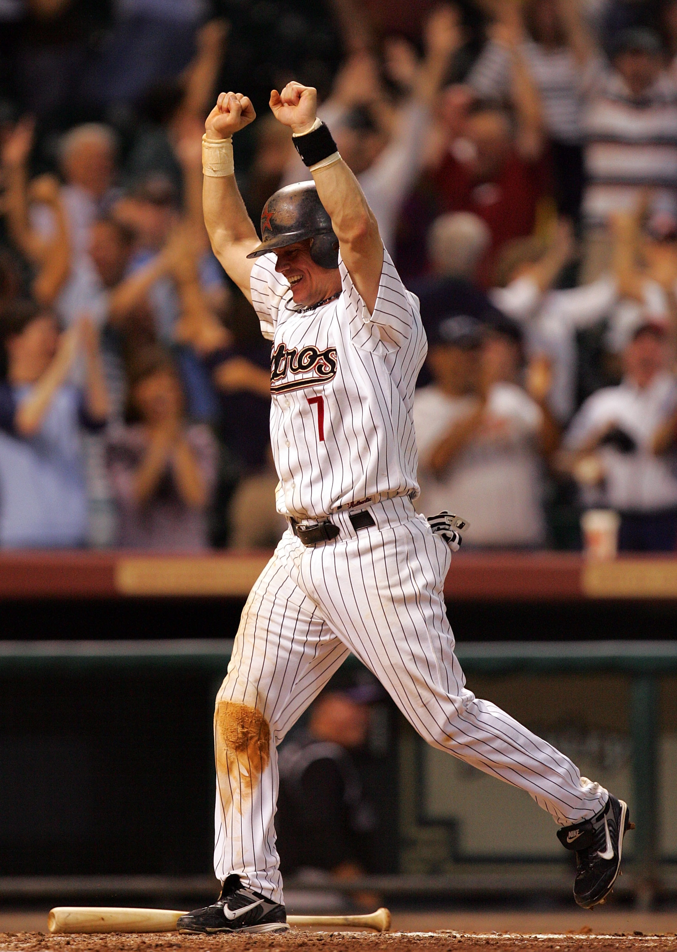 HOUSTON - JUNE 28:  Craig Biggio #7 of the Houston Astros celebrates while scoring on a Carlos Lee game winning grand slam in the 11th inning against the Colorado Rockies on June 28, 2007 at Minute Maid Park in Houston, Texas.  (Photo by Ronald Martinez/G