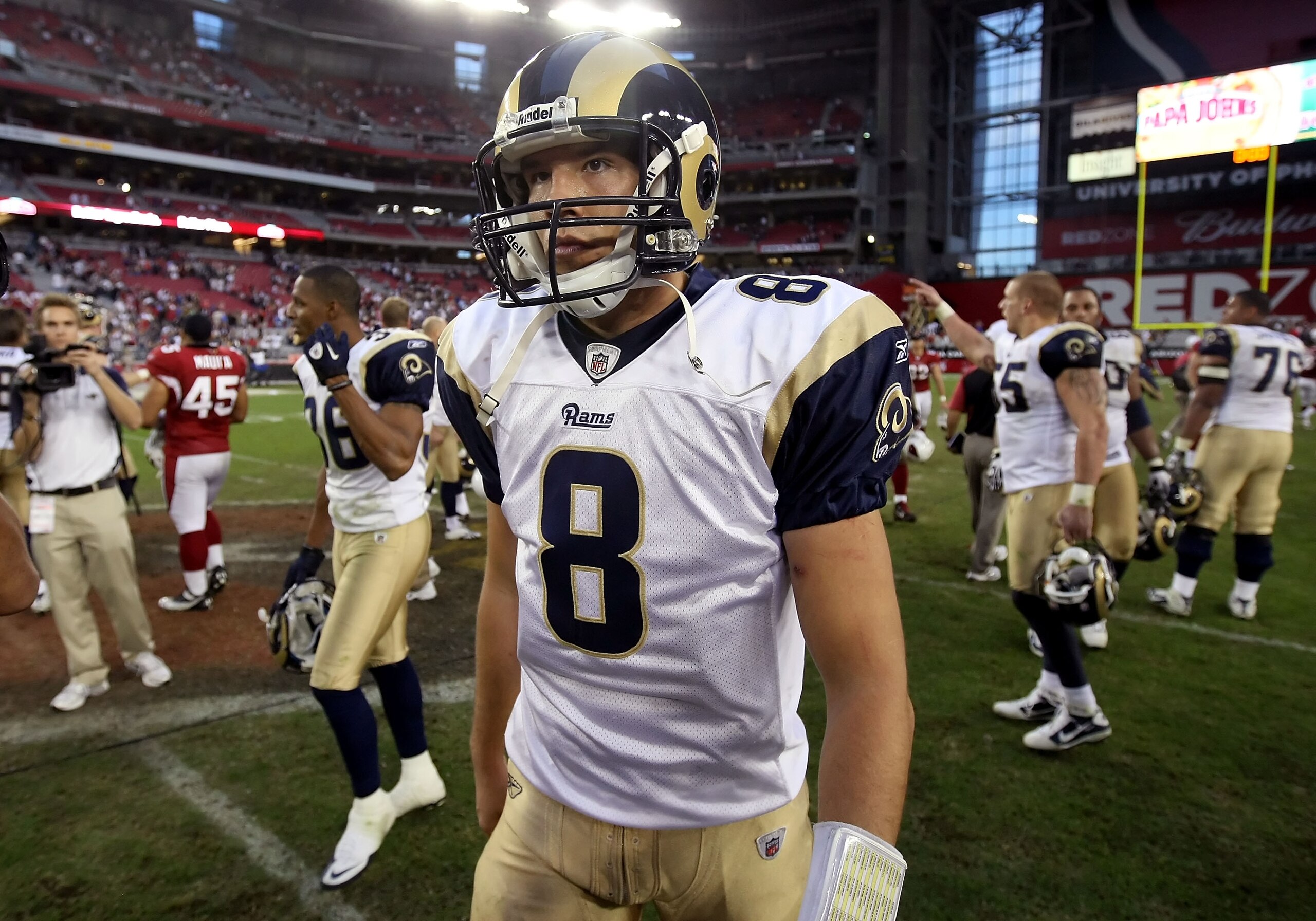 GLENDALE, AZ - DECEMBER 05: Quarterback Sam Bradford #8 of the St. Louis Rams walks off the field following the NFL game against the Arizona Cardinals at the University of Phoenix Stadium on December 5, 2010 in Glendale, Arizona. The Rams defeated the C GLENDALE, AZ - DECEMBER 05: Quarterback Sam Bradford #8 of the St. Louis Rams walks off the field following the NFL game against the Arizona Cardinals at the University of Phoenix Stadium on December 5, 2010 in Glendale, Arizona. The Rams defeated the C