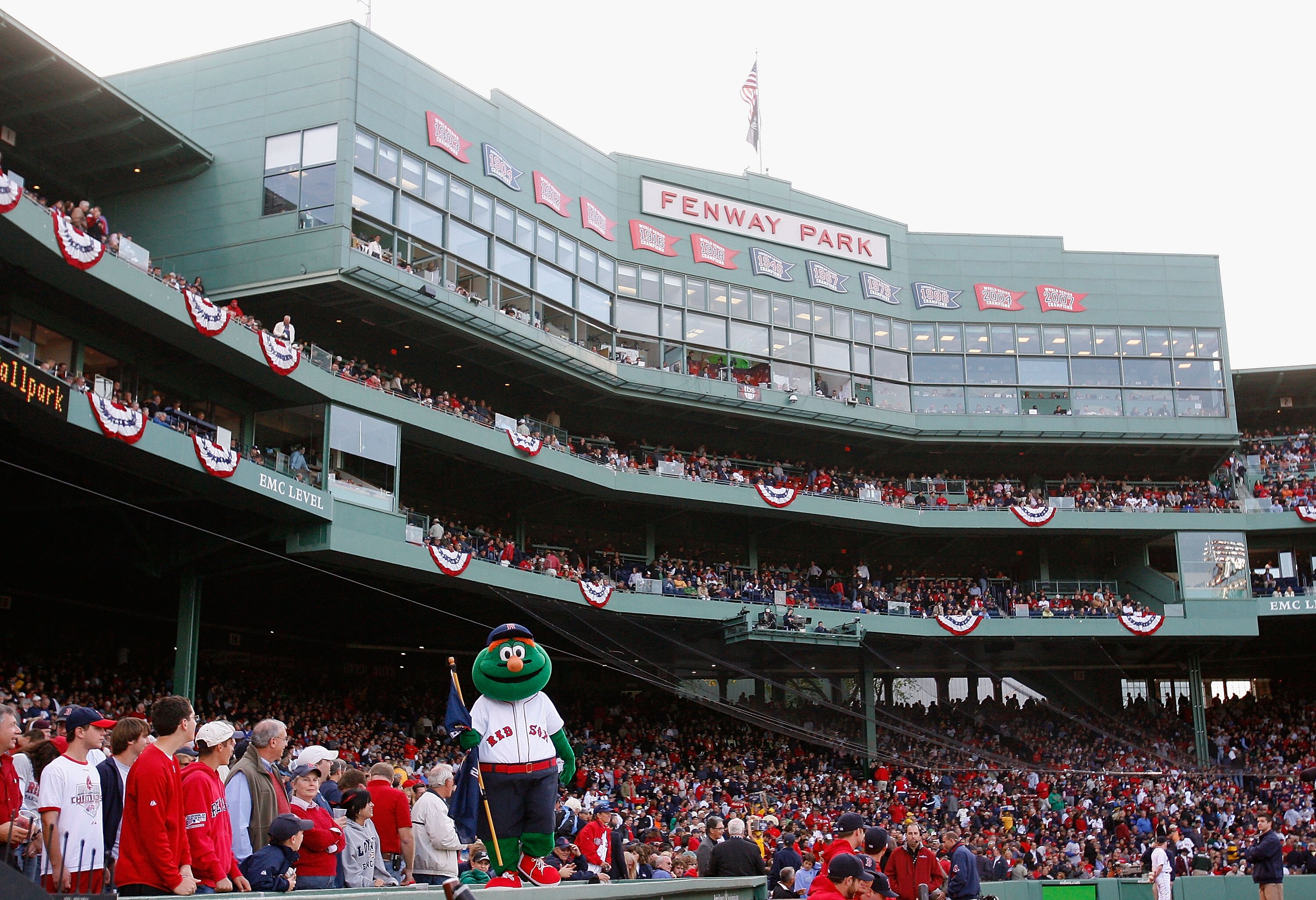 BOSTON - OCTOBER 13:  The Boston Red Sox mascot, Wally the Green Monster stands on the dugout inbetween innings of game three of the American League Championship Series against the Tampa Bay Rays during the 2008 MLB playoffs at Fenway Park on October 13,