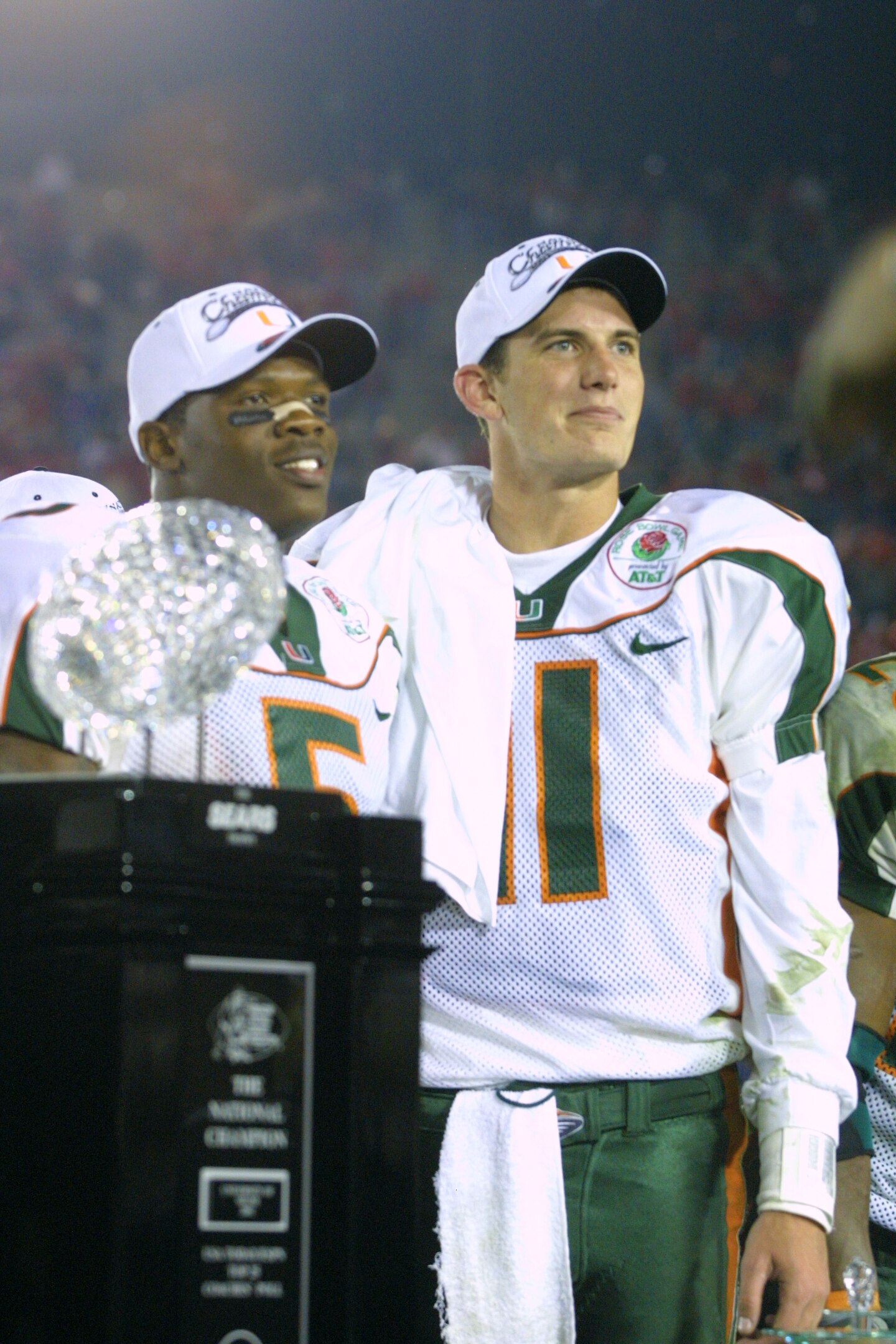 3 Jan 2002:   University of Miami quarterback Ken Dorsey #11 and running back Andre Johnson #5, named co MVP's, stand on the victory podium after the Rose Bowl National Championship Game versus Nebraska at the Rose Bowl in Pasadena, California.  Miami won