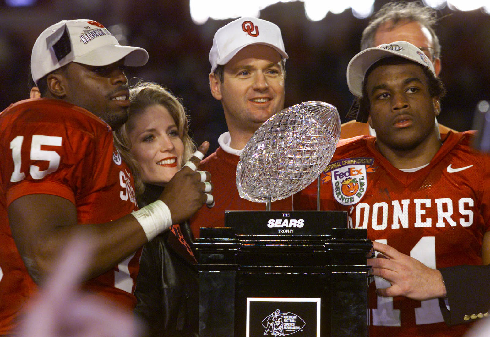 3 Jan 2001:  Head Coach Bob Stoops, J.T. Thatcher #15 and Ontei Jones #11 of the Oklahoma Sooners celebrate after defeating the Florida State Seminoles 13-2 to win the Orange Bowl at Pro Player Stadium in Miami, Florida. DIGITAL IMAGE Mandatory Credit: Br
