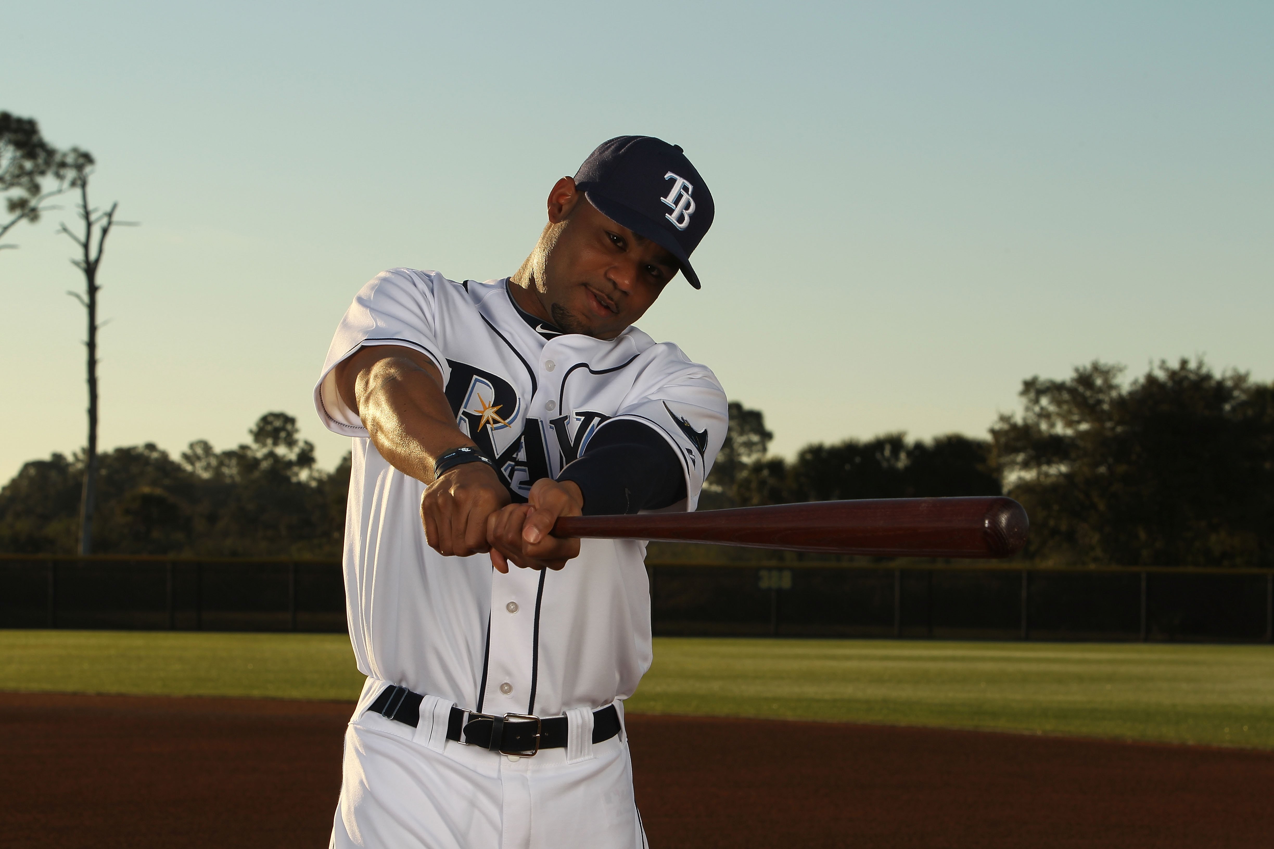 PORT CHARLOTTE, FL - FEBRUARY 26:  Carl Crawford #13 of the Tampa Bay Rays poses for a photo during Spring Training Media Photo Day at Charlotte County Sports Park on February 26, 2010 in Port Charlotte, Florida.  (Photo by Nick Laham/Getty Images)