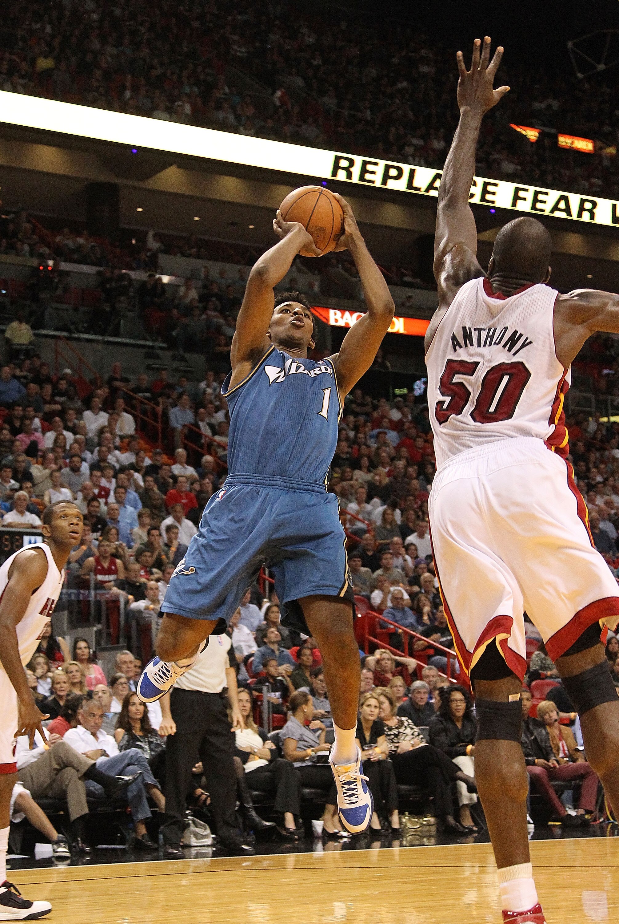 MIAMI, FL - NOVEMBER 29:  Nick Young #1 of the Washington Wizards shoots over Joel Anthony #50 of the Miami Heat during a game at American Airlines Arena on November 29, 2010 in Miami, Florida. NOTE TO USER: User expressly acknowledges and agrees that, by