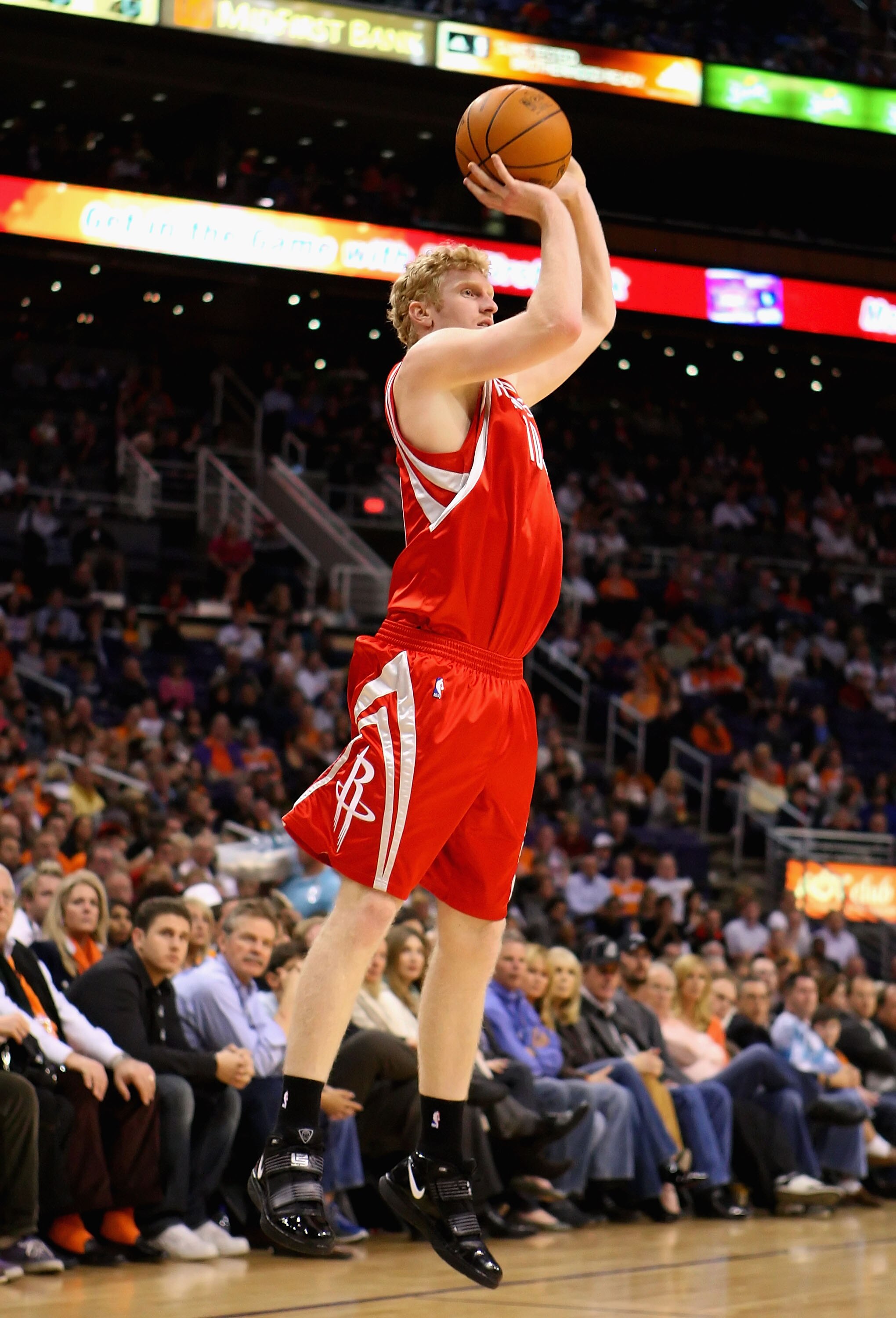 PHOENIX - JANUARY 06:  Chase Budinger #10 of the Houston Rockets puts up a shot against the Phoenix Suns during the NBA game at US Airways Center on January 6, 2010 in Phoenix, Arizona. NOTE TO USER: User expressly acknowledges and agrees that, by downloa