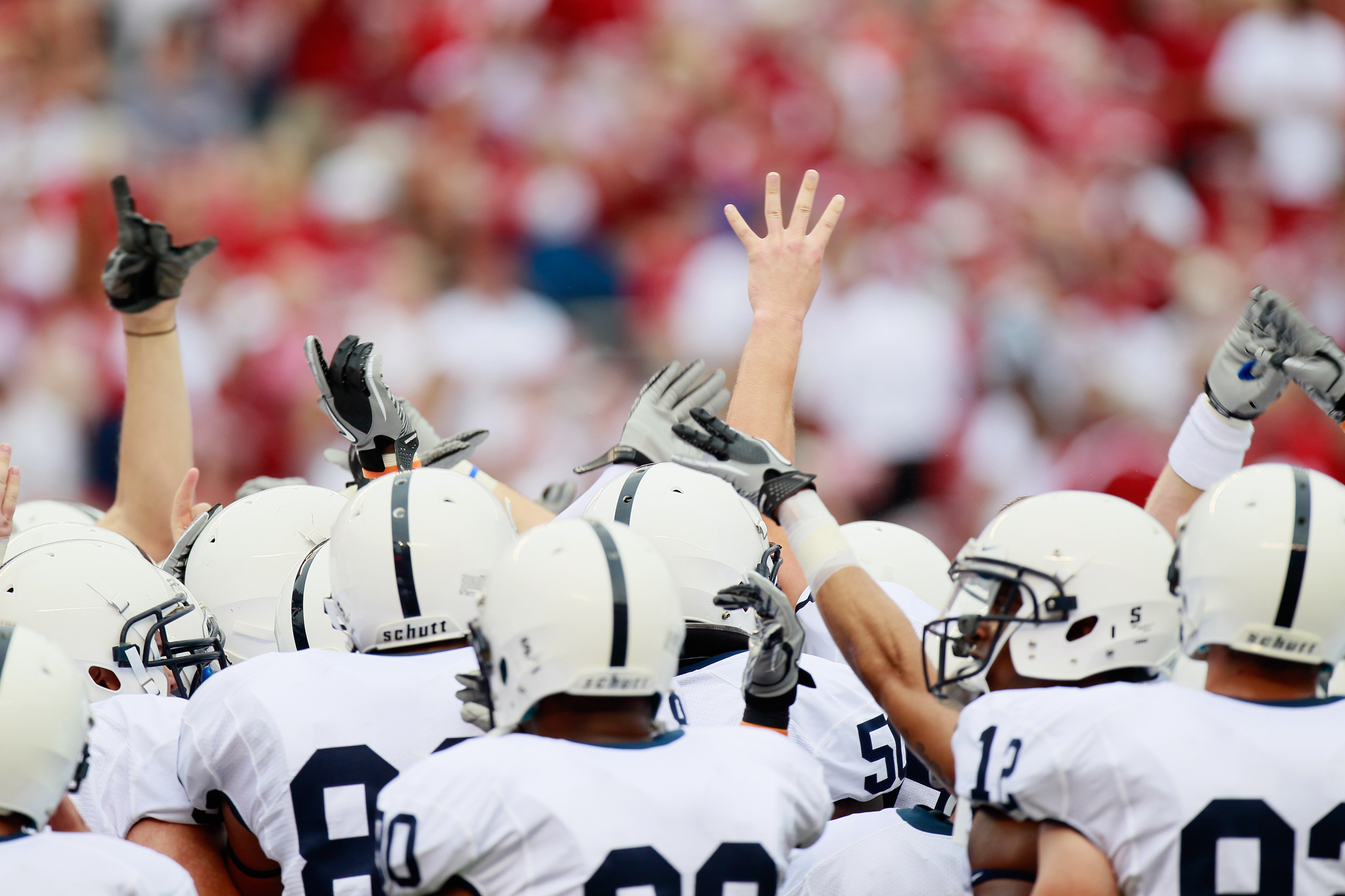 TUSCALOOSA, AL - SEPTEMBER 11:  The Penn State Nittany Lions huddle during warmups before facing the Alabama Crimson Tide at Bryant-Denny Stadium on September 11, 2010 in Tuscaloosa, Alabama.  (Photo by Kevin C. Cox/Getty Images)